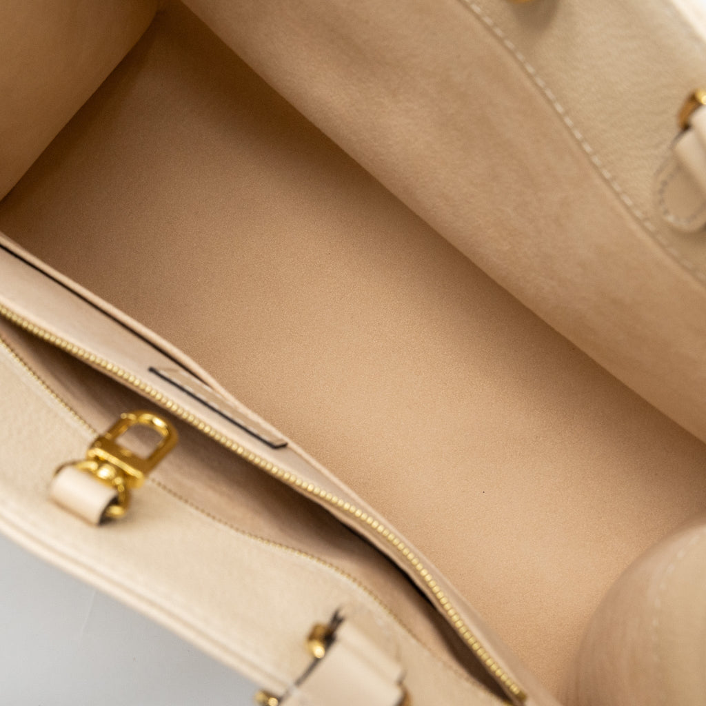 louis-vuitton-onthego-mm-empreinte-leather-white-ghw-new-version