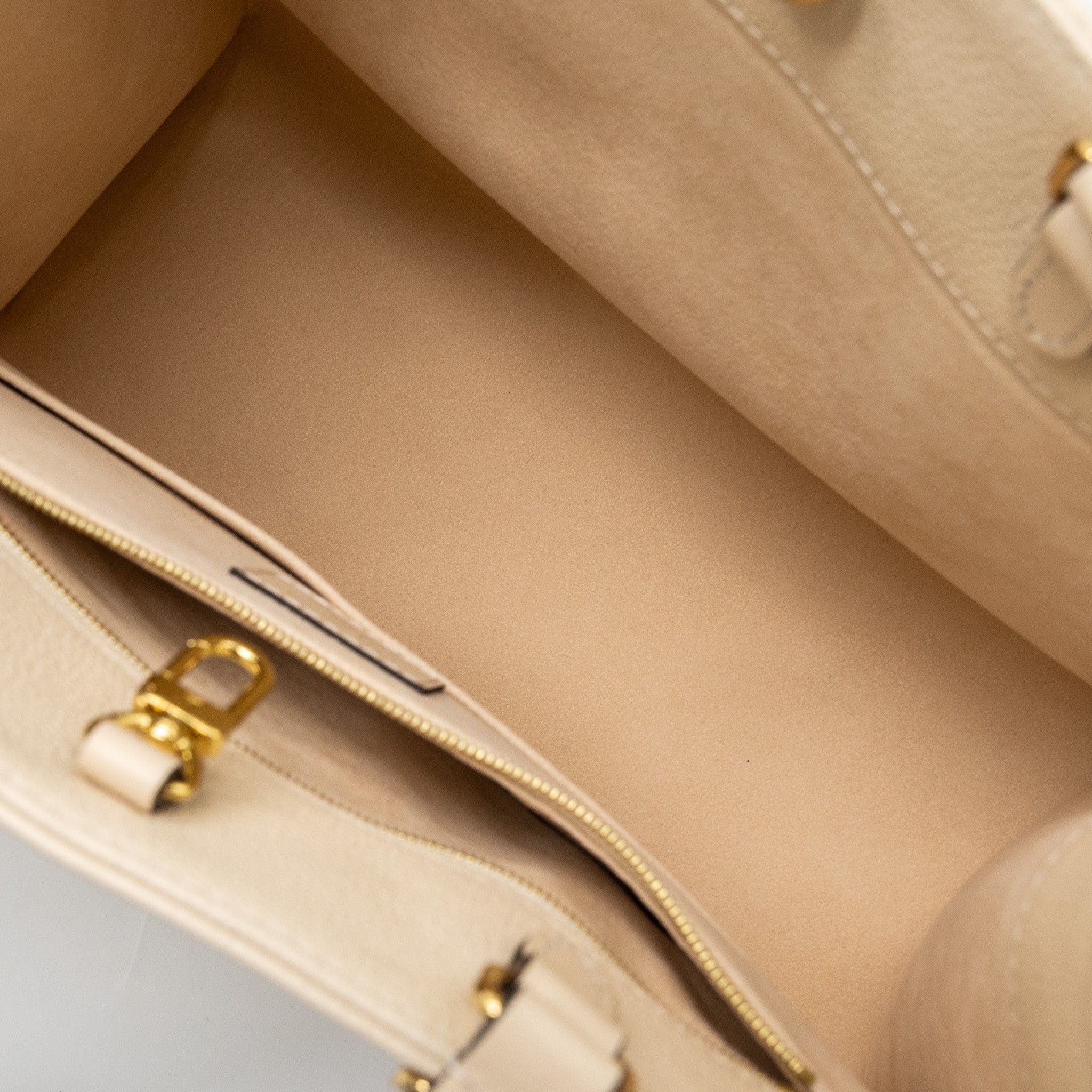 louis-vuitton-onthego-mm-empreinte-leather-white-ghw-new-version
