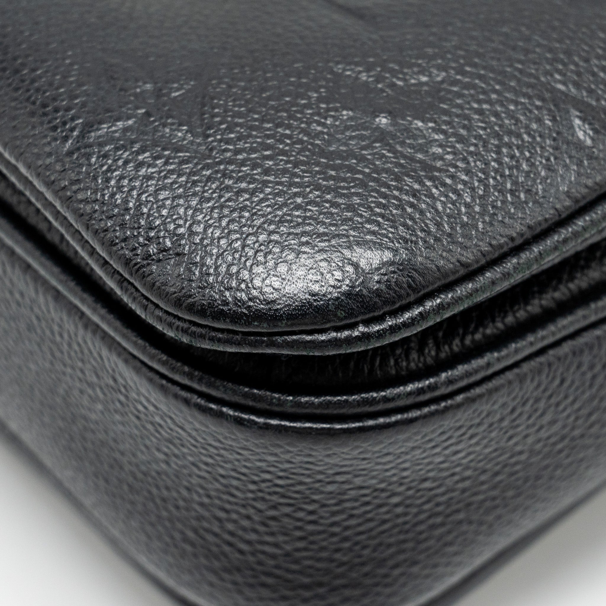 louis-vuitton-pochette-metis-monogram-empreinte-black-ghw-7