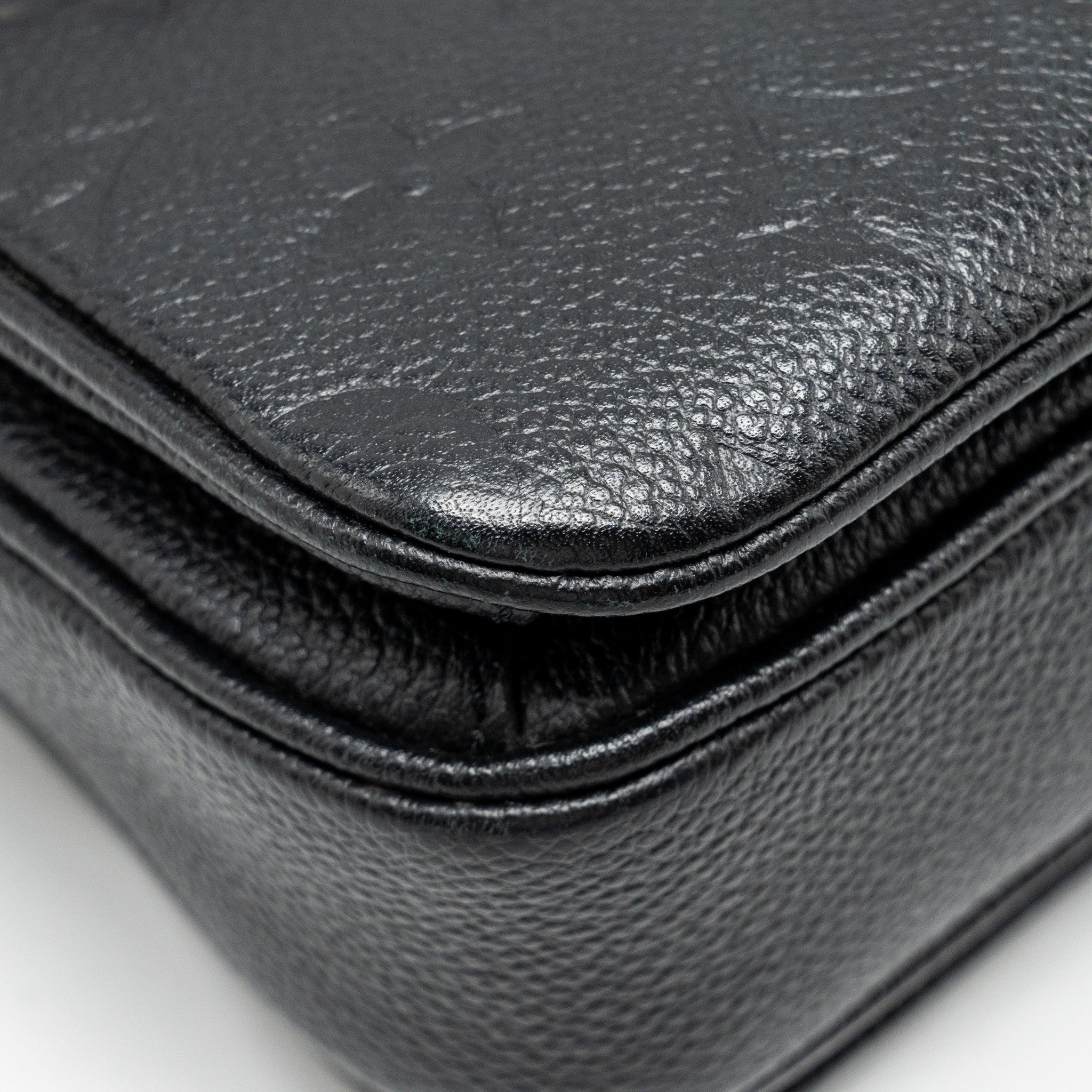 louis-vuitton-pochette-metis-monogram-empreinte-black-ghw-7