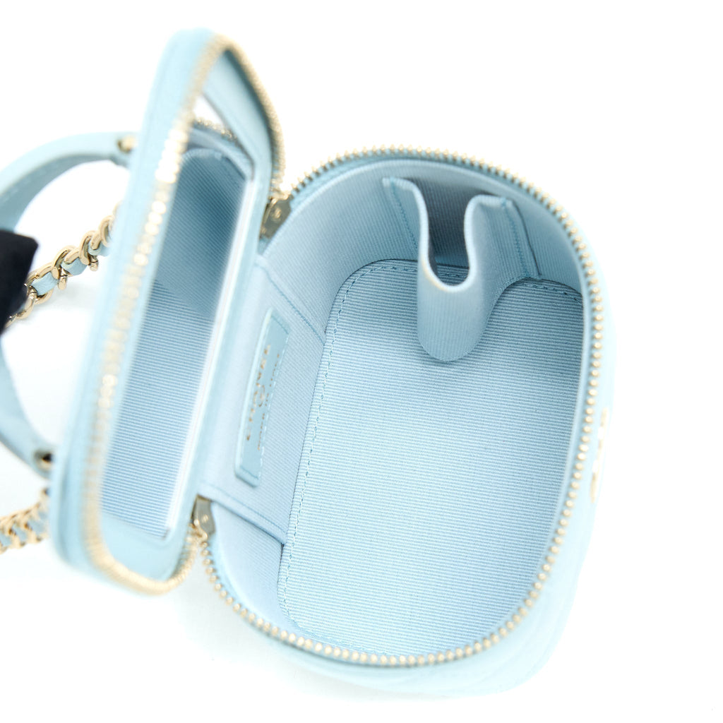 chanel-22p-top-handle-mini-vanity-with-chain-lambskin-light-blue-lghw