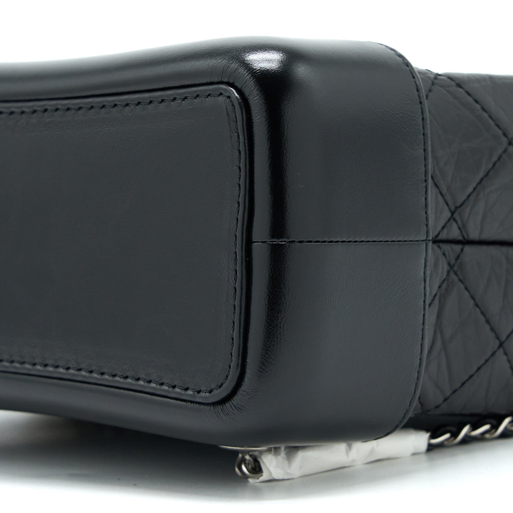 chanel-gabrielle-backpack-aged-calfskin-black-multicolour-hardware-microchip