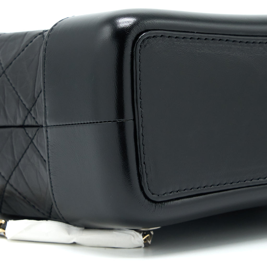 chanel-gabrielle-backpack-aged-calfskin-black-multicolour-hardware-microchip