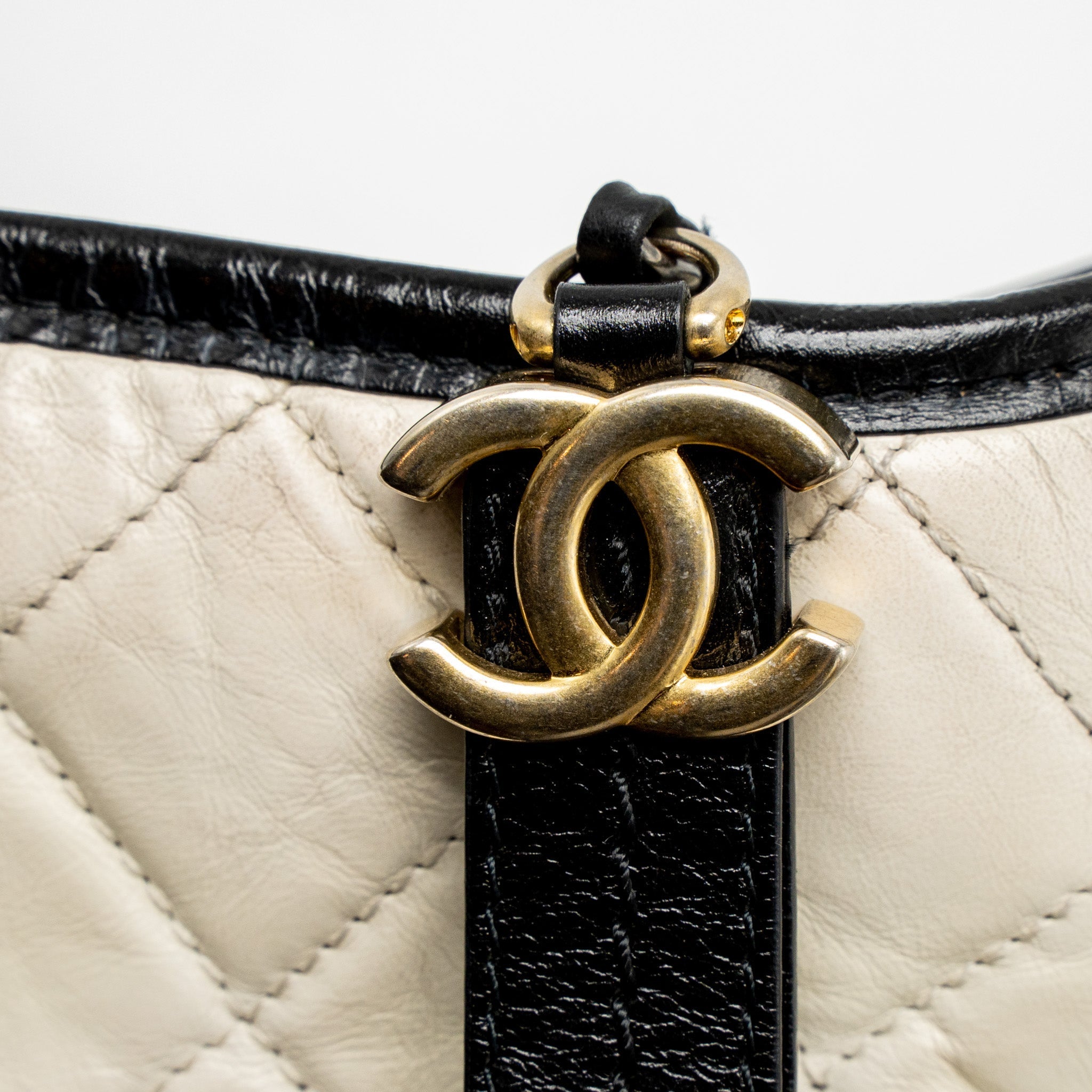 chanel-small-gabrielle-hobo-bag-aged-calfskin-white-black-multicolour-hardware