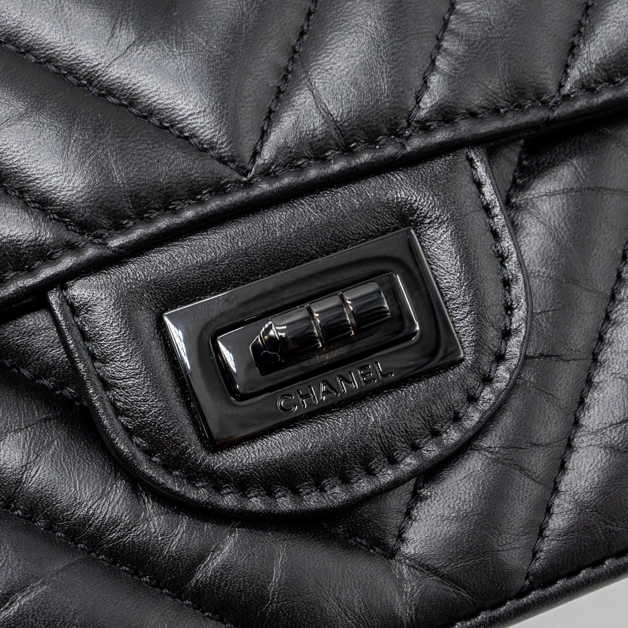 copy-of-chanel-mini-2-55-reissue-flap-bag-chevron-calfskin-so-black