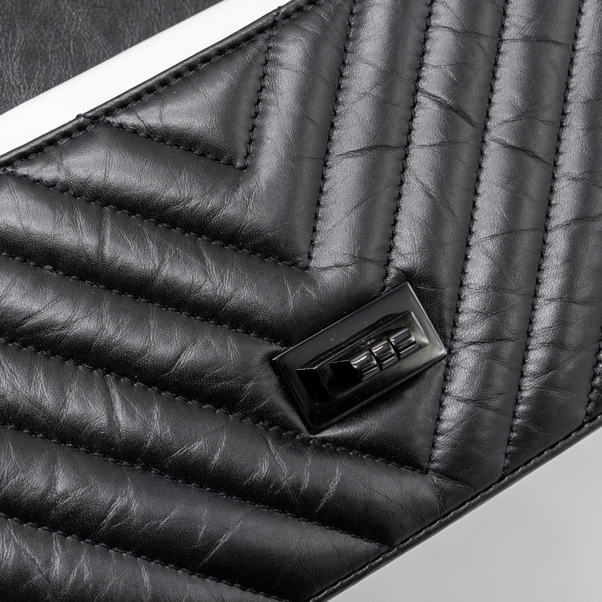copy-of-chanel-mini-2-55-reissue-flap-bag-chevron-calfskin-so-black