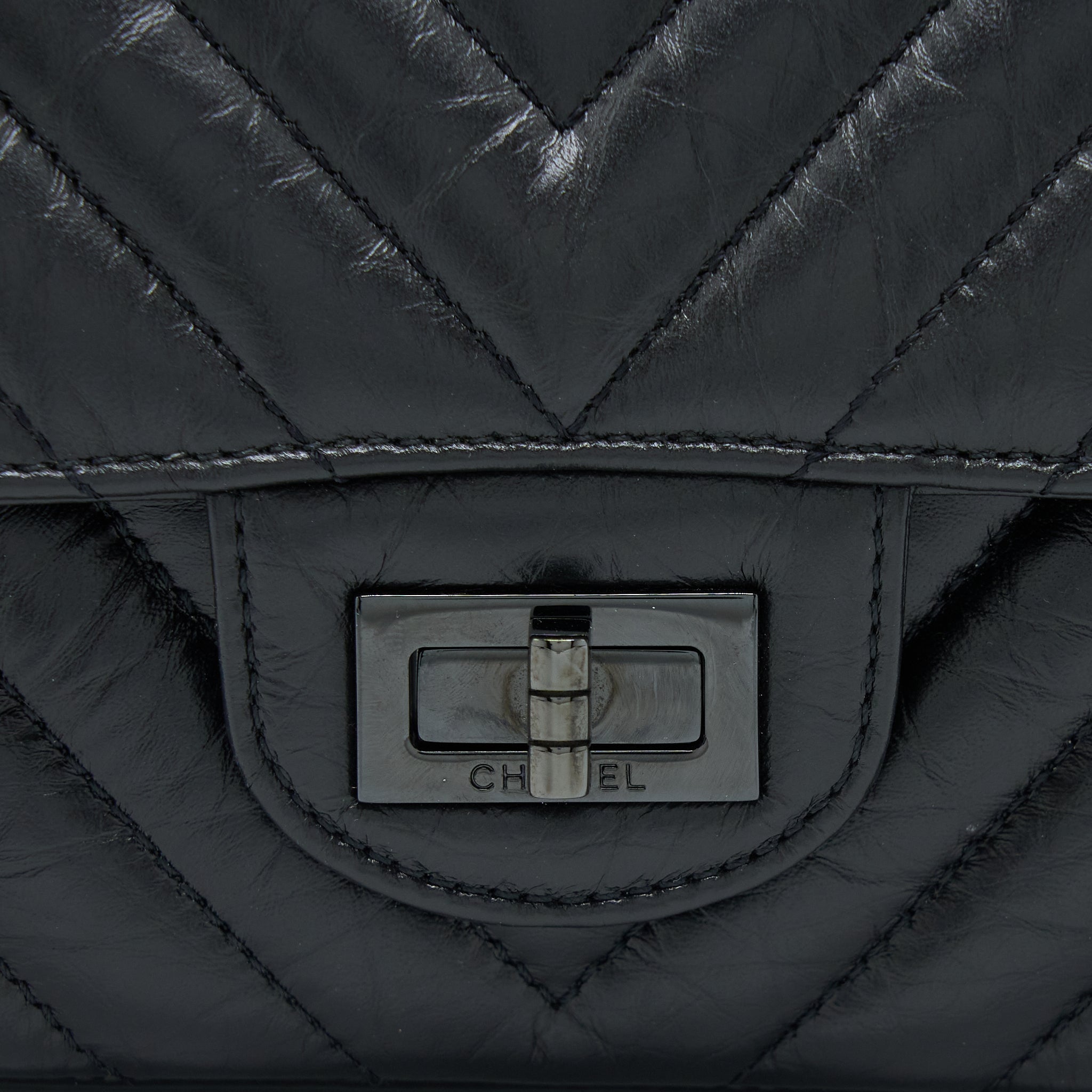chanel-mini-reissue-2-55-flap-bag-chevron-aged-calfskin-so-black