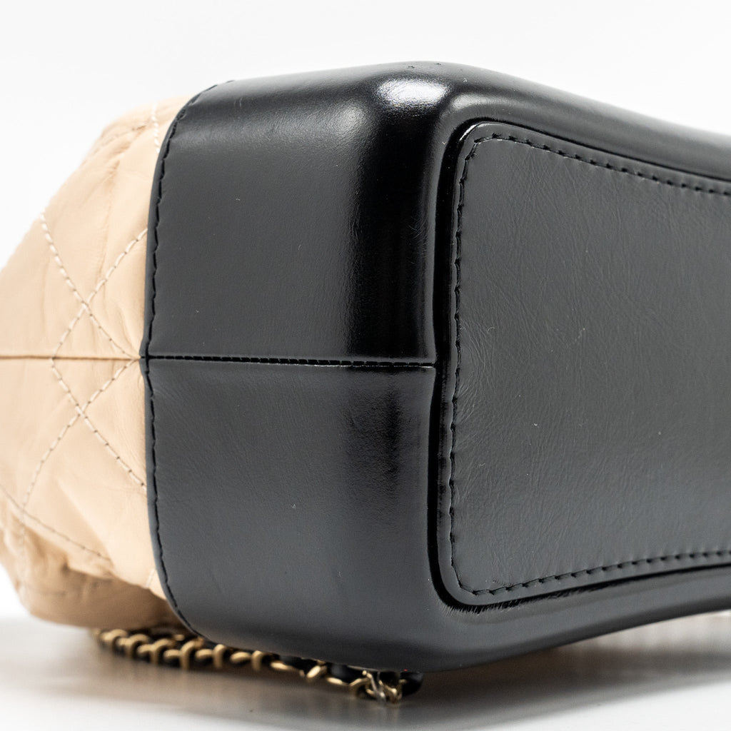 chanel-small-gabrielle-backpack-aged-calfskin-beige-black-multicolour-hardware