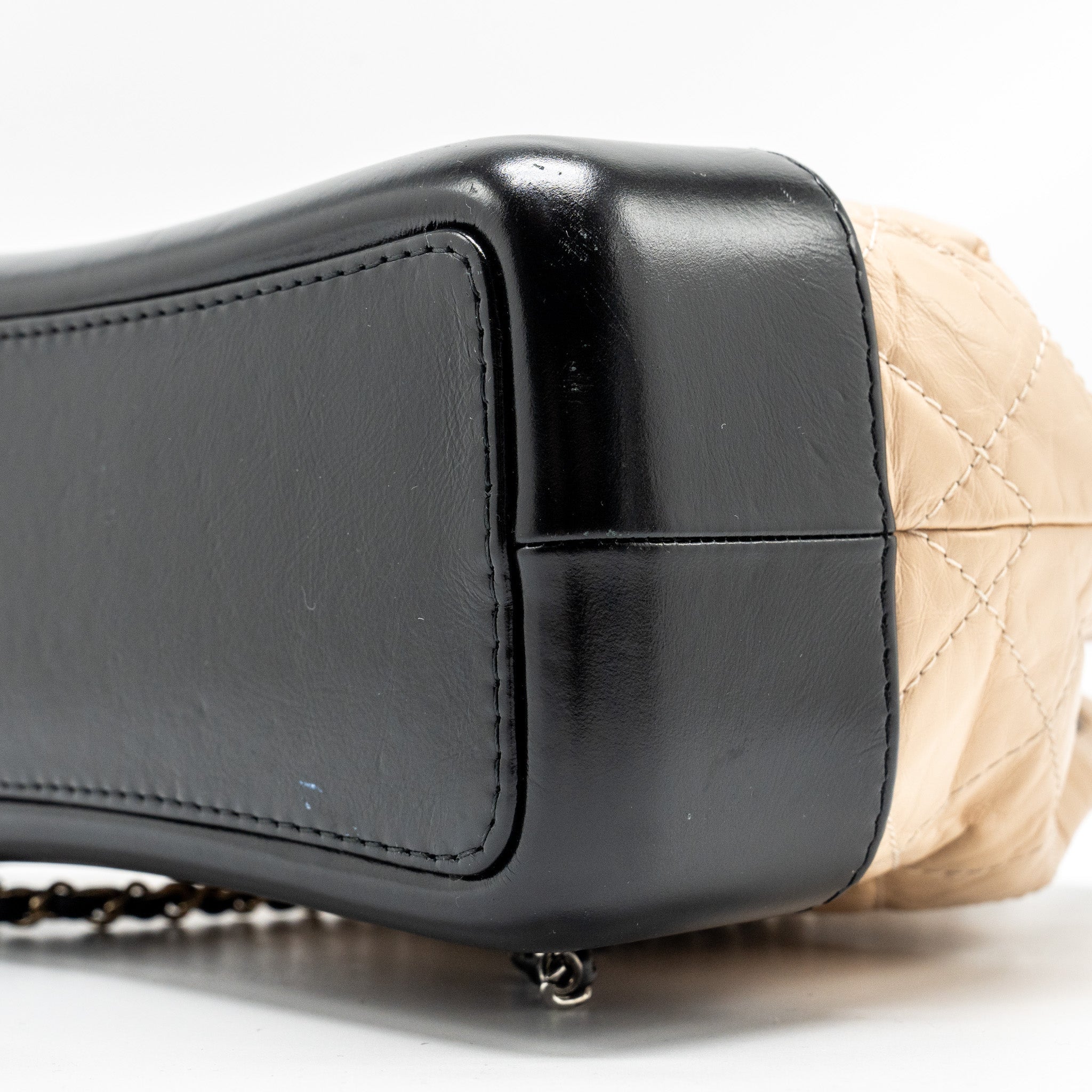 chanel-small-gabrielle-backpack-aged-calfskin-beige-black-multicolour-hardware