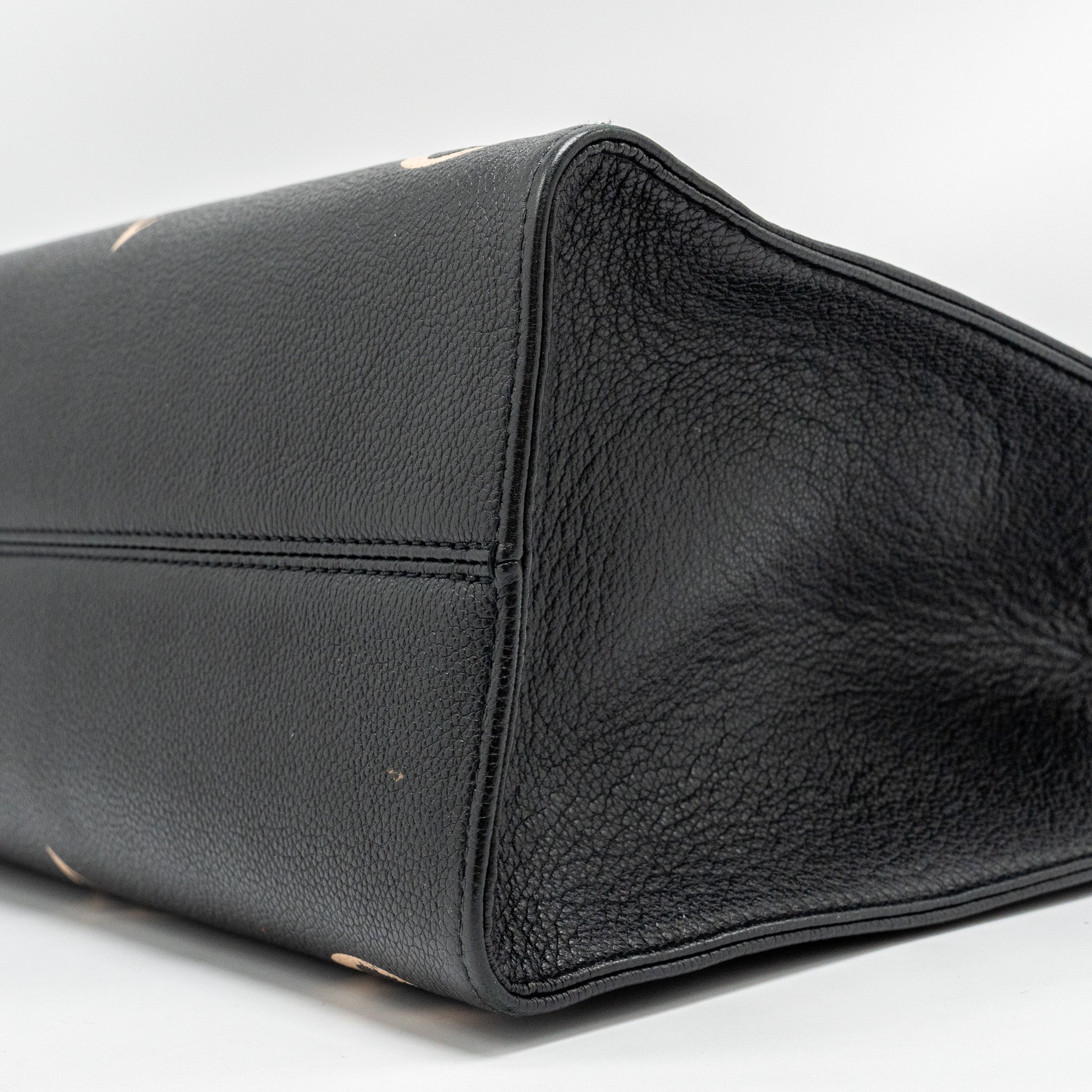 louis-vuitton-onthego-mm-bicolour-monogram-empreinte-black-beige-ghw-copy