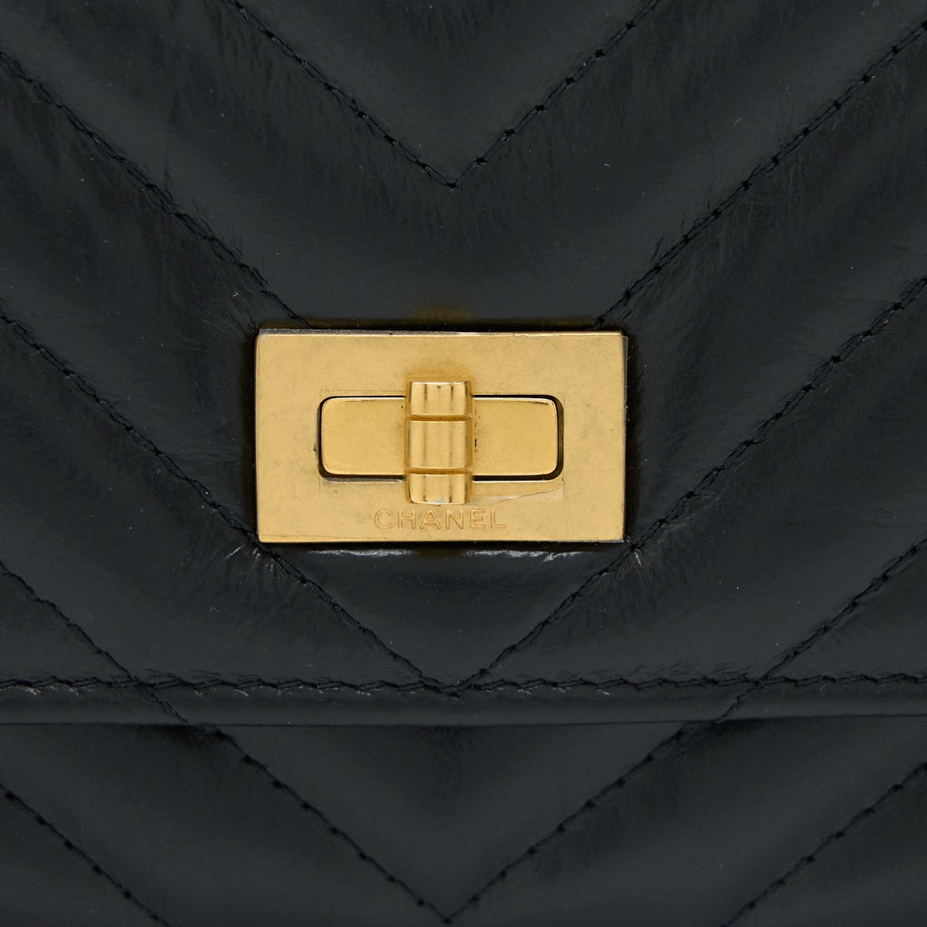 chanel-2-55-reissue-wallet-on-chain-chevron-aged-calfskin-black-brushed-ghw-microchip