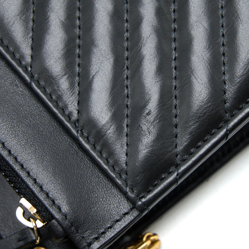 chanel-2-55-reissue-wallet-on-chain-chevron-aged-calfskin-black-brushed-ghw-microchip