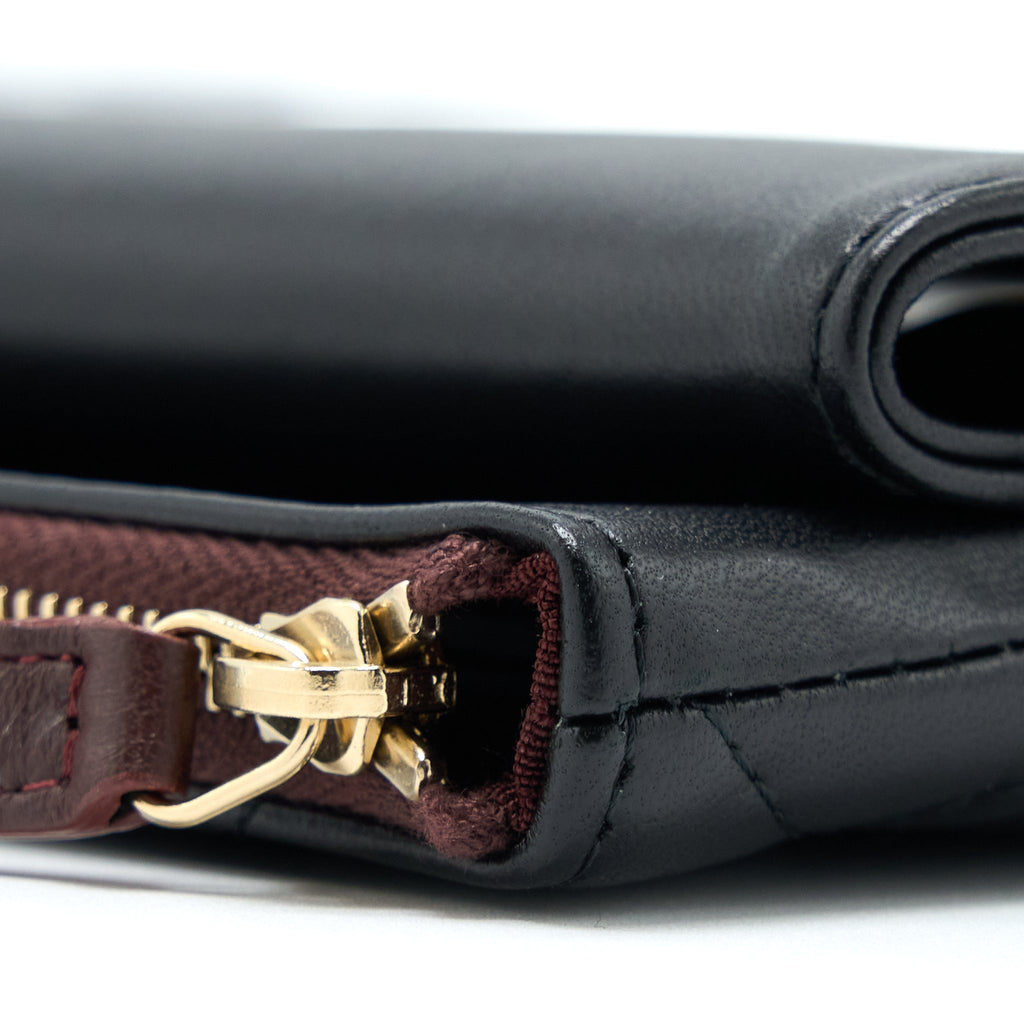 chanel-quilted-zip-and-flap-pouch-clutch-large-model-lambskin-black-lghw