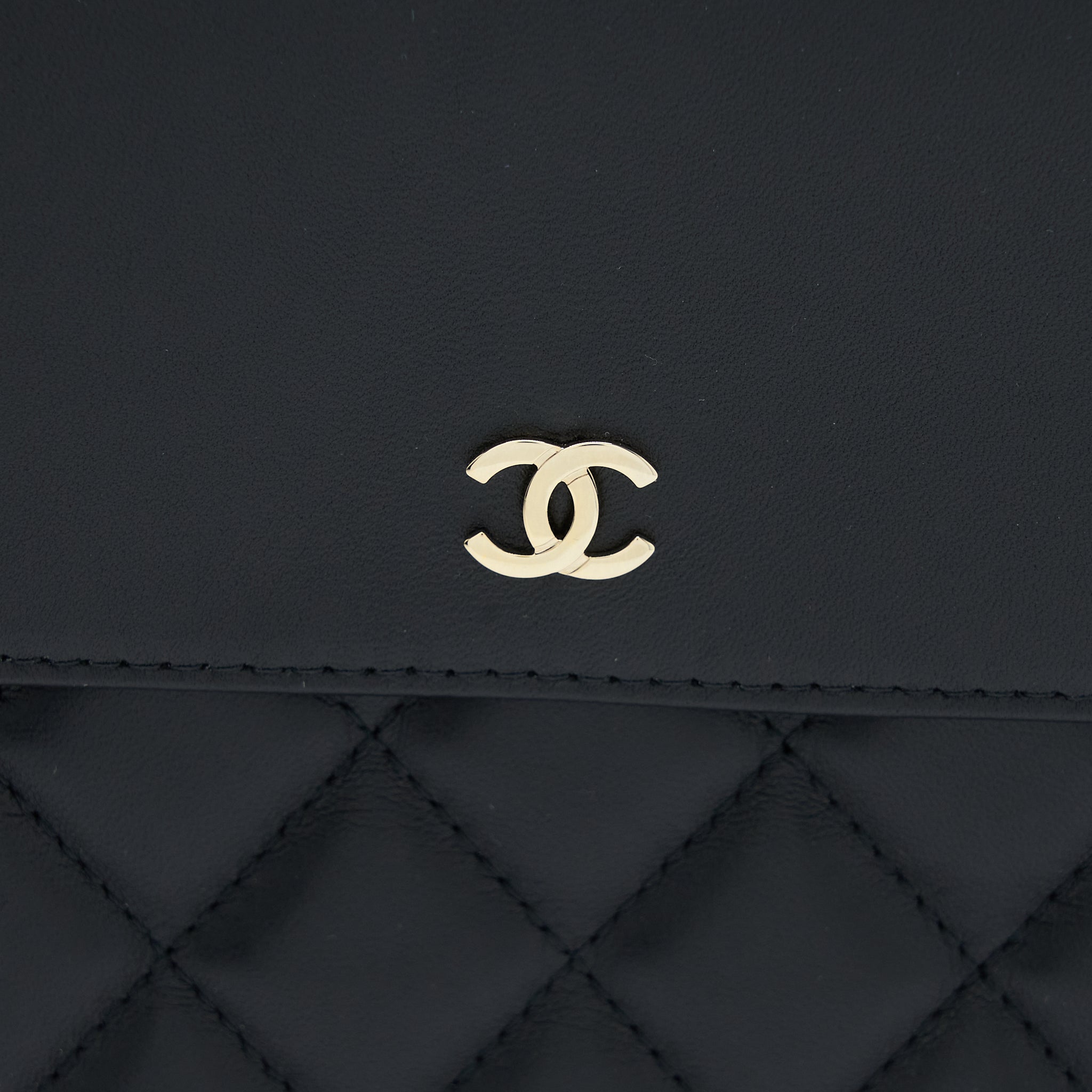 chanel-quilted-zip-and-flap-pouch-clutch-large-model-lambskin-black-lghw