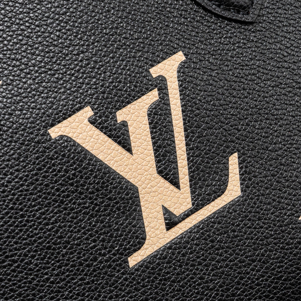 louis-vuitton-onthego-pm-bicolour-monogram-empreinte-leather-black-beige-ghw