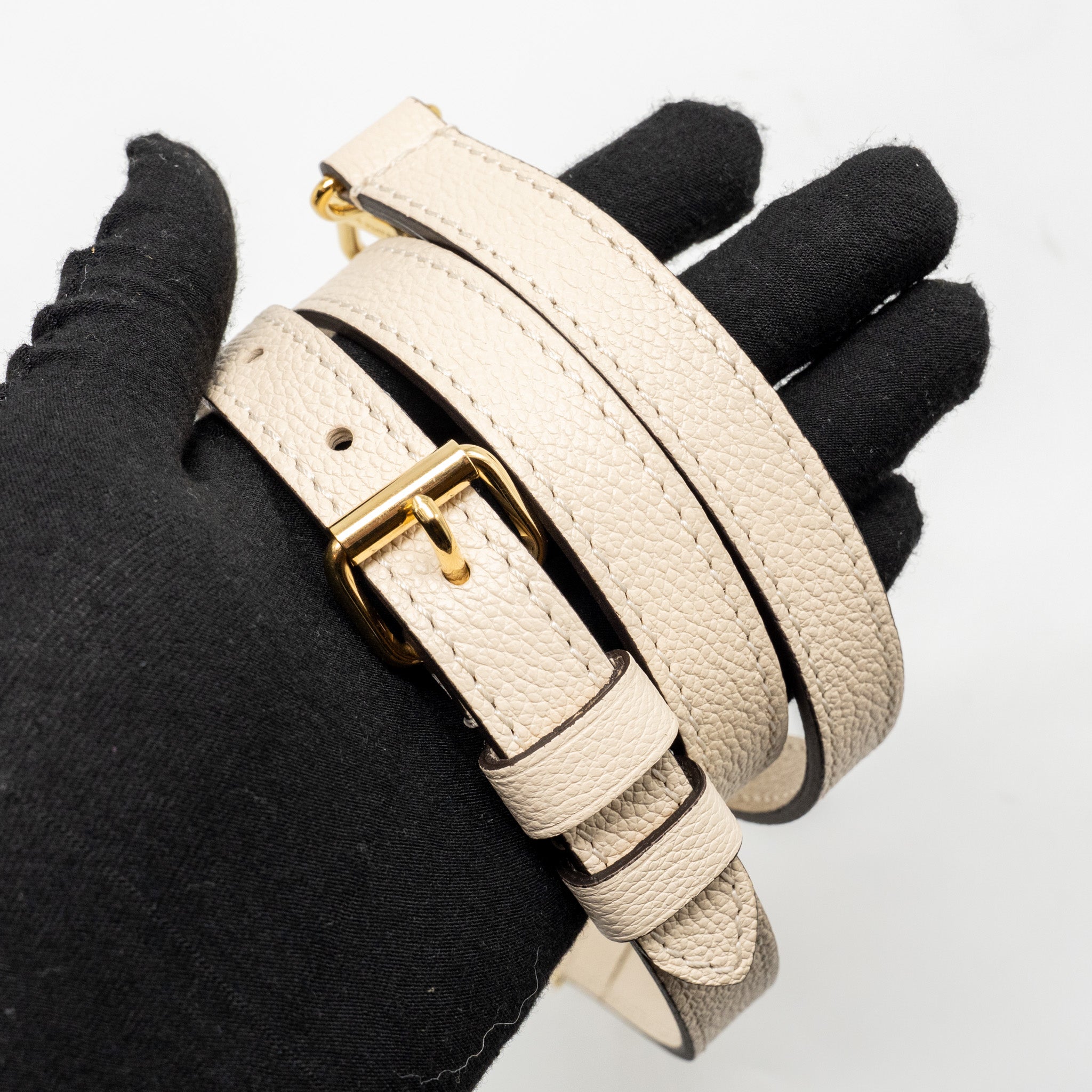 louis-vuitton-onthego-pm-monogram-empreinte-leather-creme-ghw