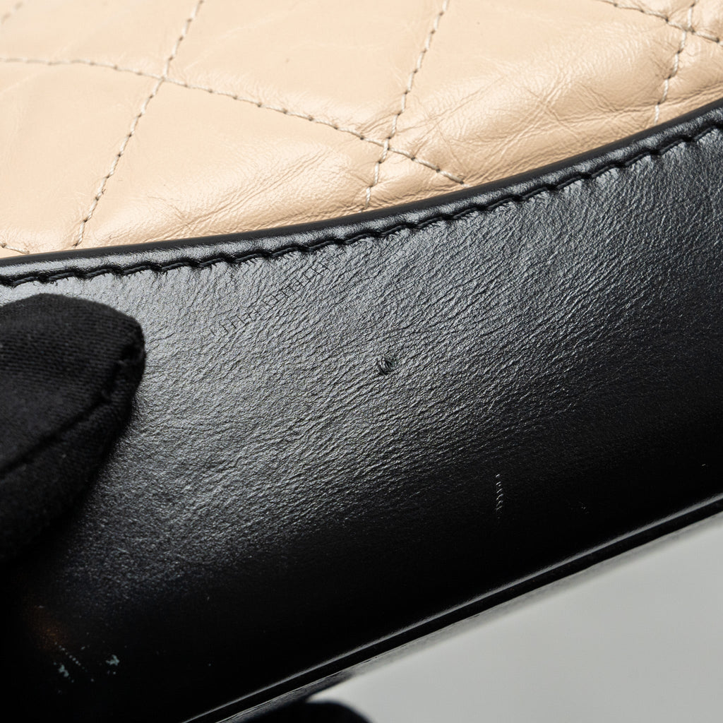 chanel-small-gabrielle-backpack-aged-calfskin-beige-black-multicolour-hardware
