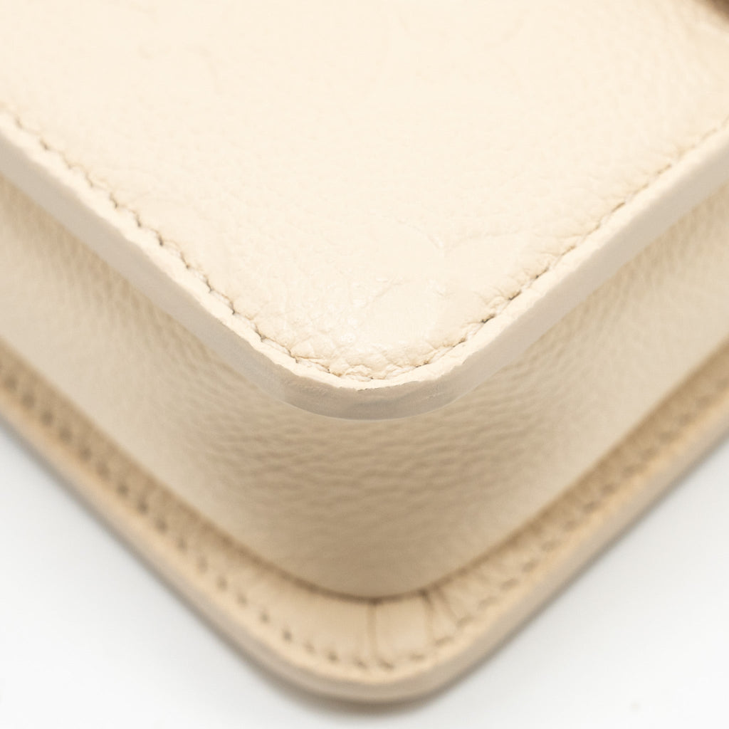louis-vuitton-wallet-on-chain-metis-monogram-empreinte-cream-ghw