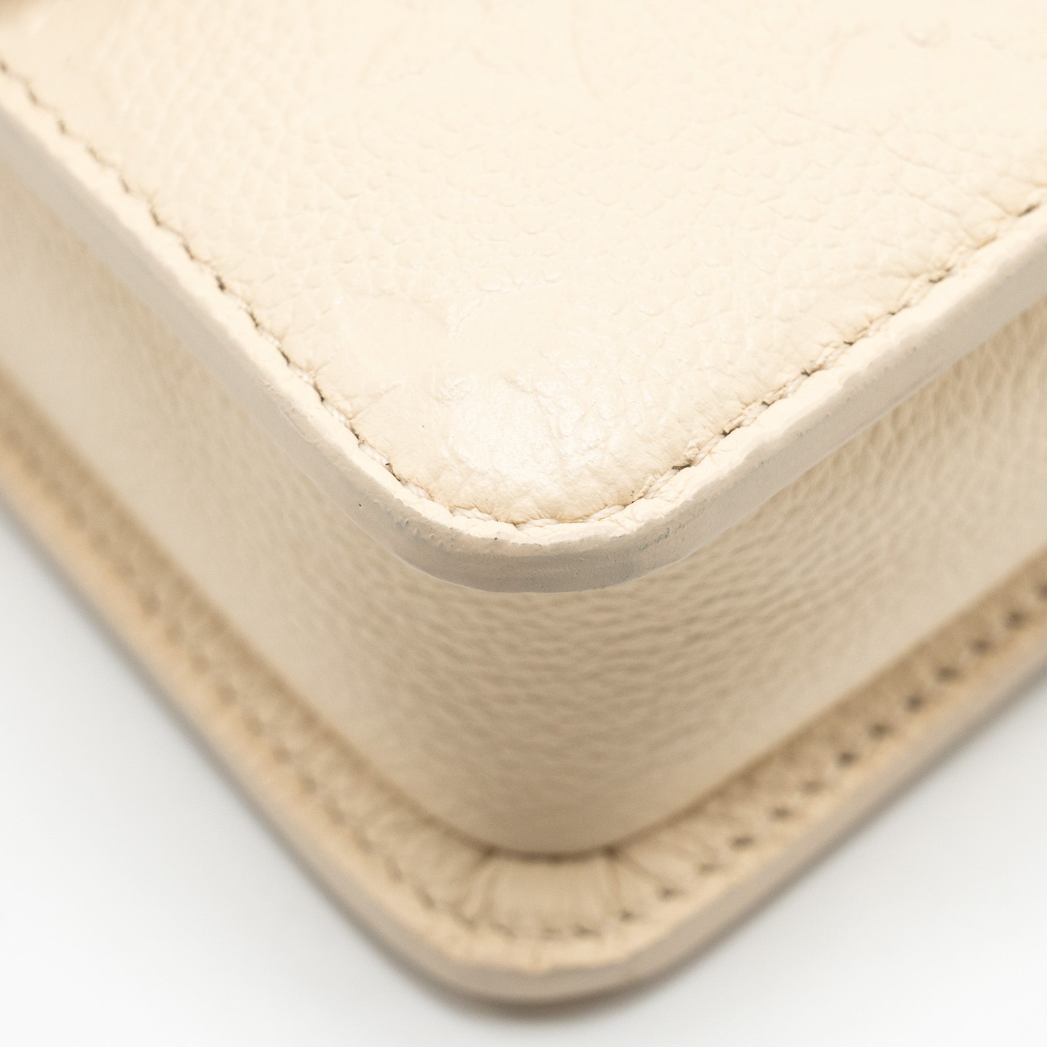 louis-vuitton-wallet-on-chain-metis-monogram-empreinte-cream-ghw