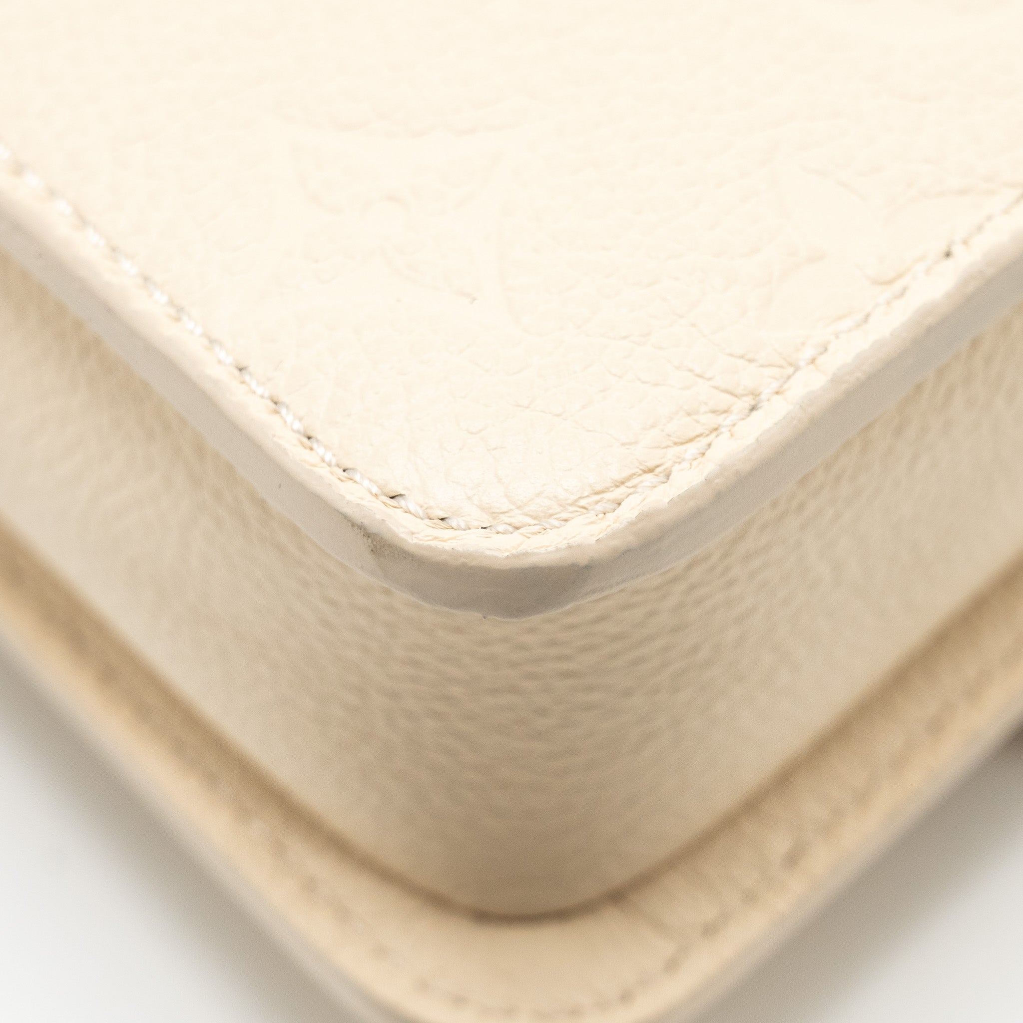 louis-vuitton-wallet-on-chain-metis-monogram-empreinte-cream-ghw