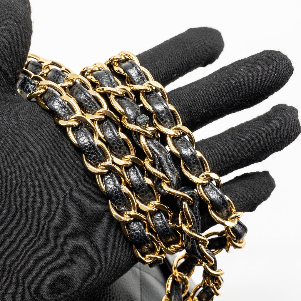 chanel-maxi-classic-double-flap-bag-caviar-black-ghw-1