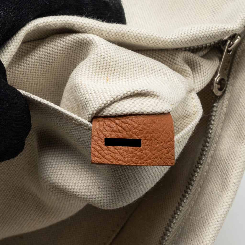goyard-boheme-hobo-bag-canvas-calfskin-black-tan-shw-with-necessaire-bag-ecru