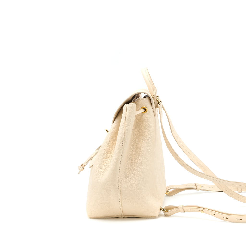 louis-vuitton-montsouris-monogram-empreinte-cream-ghw