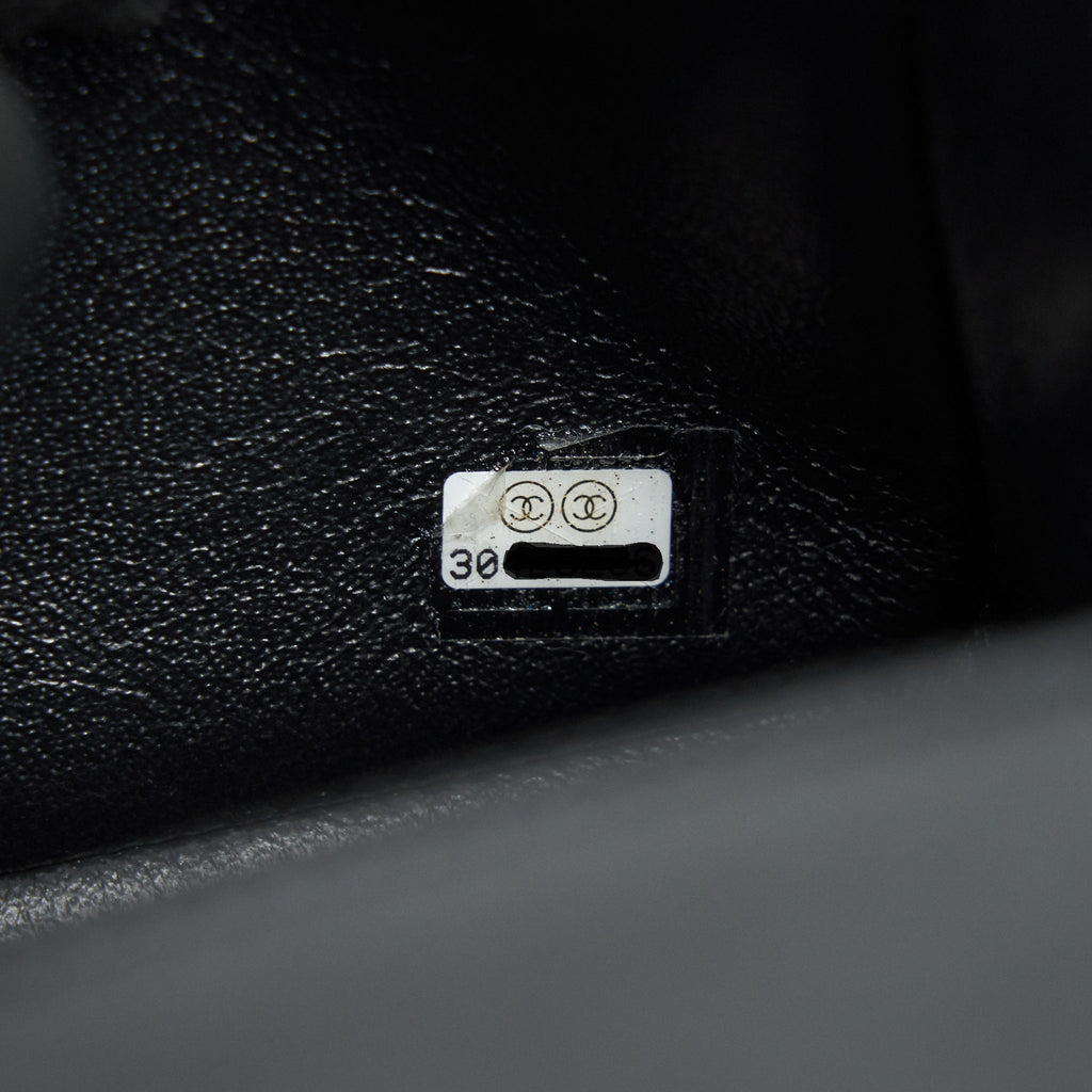 chanel-lambskin-rectangular-mini-flap-bag-in-black-shw