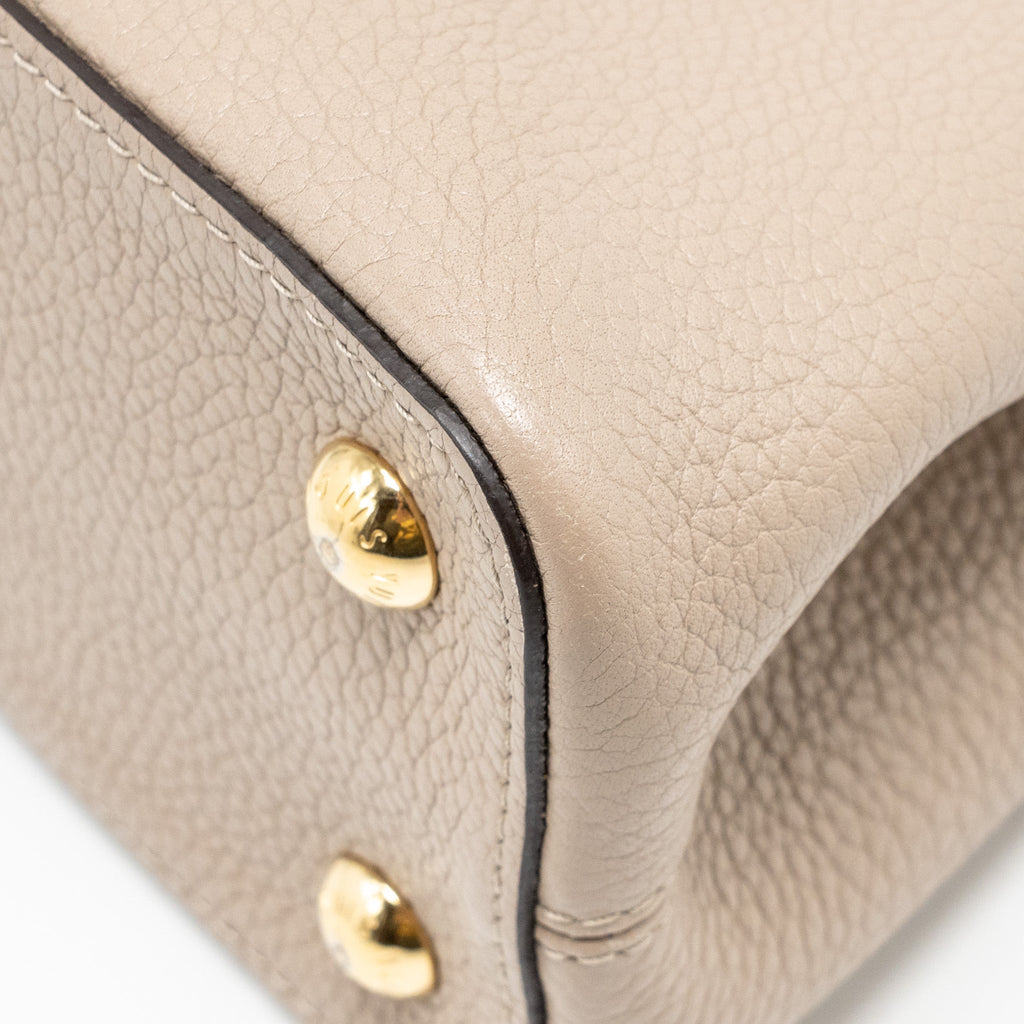 louis-vuitton-capucines-mm-taurillon-leather-light-grey-ghw
