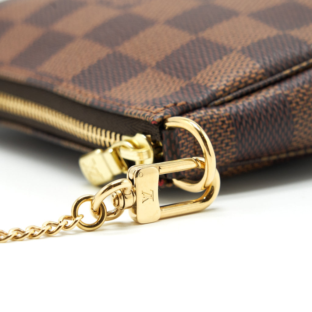 louis-vuitton-mini-pochette-accessories-damier-ebene-canvas-1