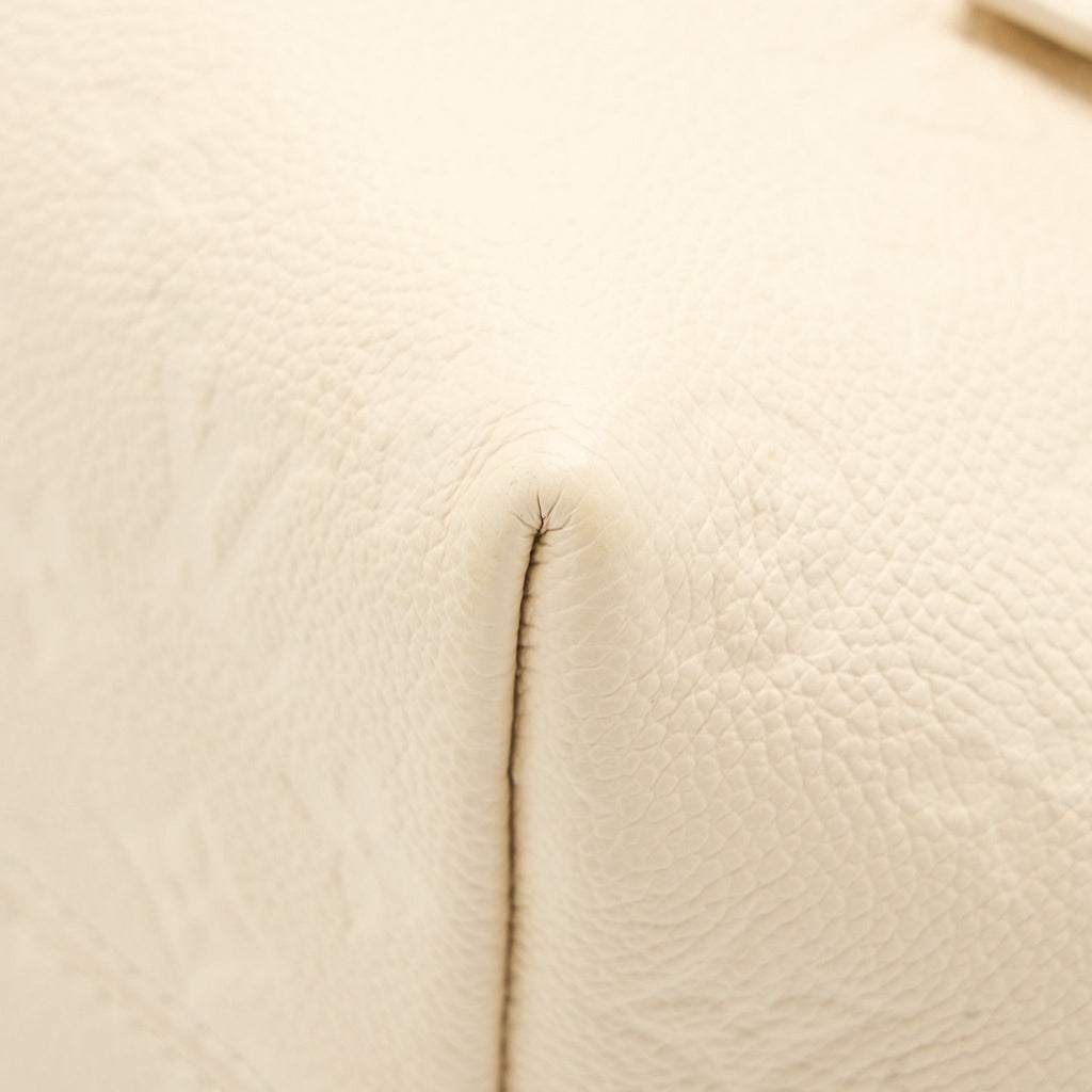 louis-vuitton-montsouris-monogram-empreinte-cream-ghw