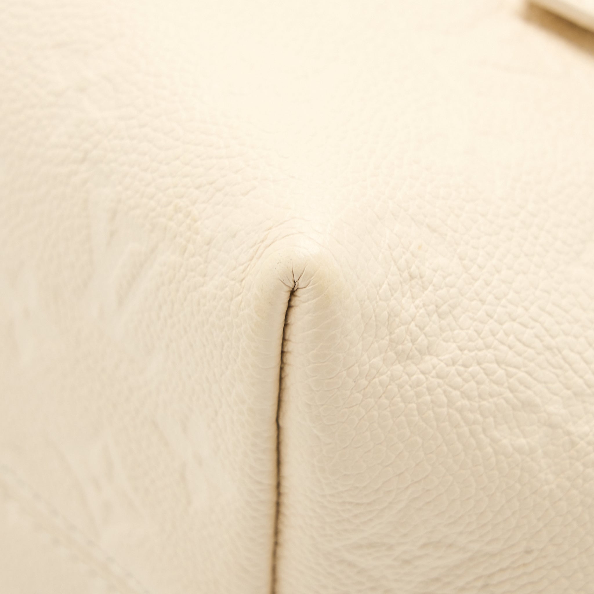 louis-vuitton-montsouris-monogram-empreinte-cream-ghw