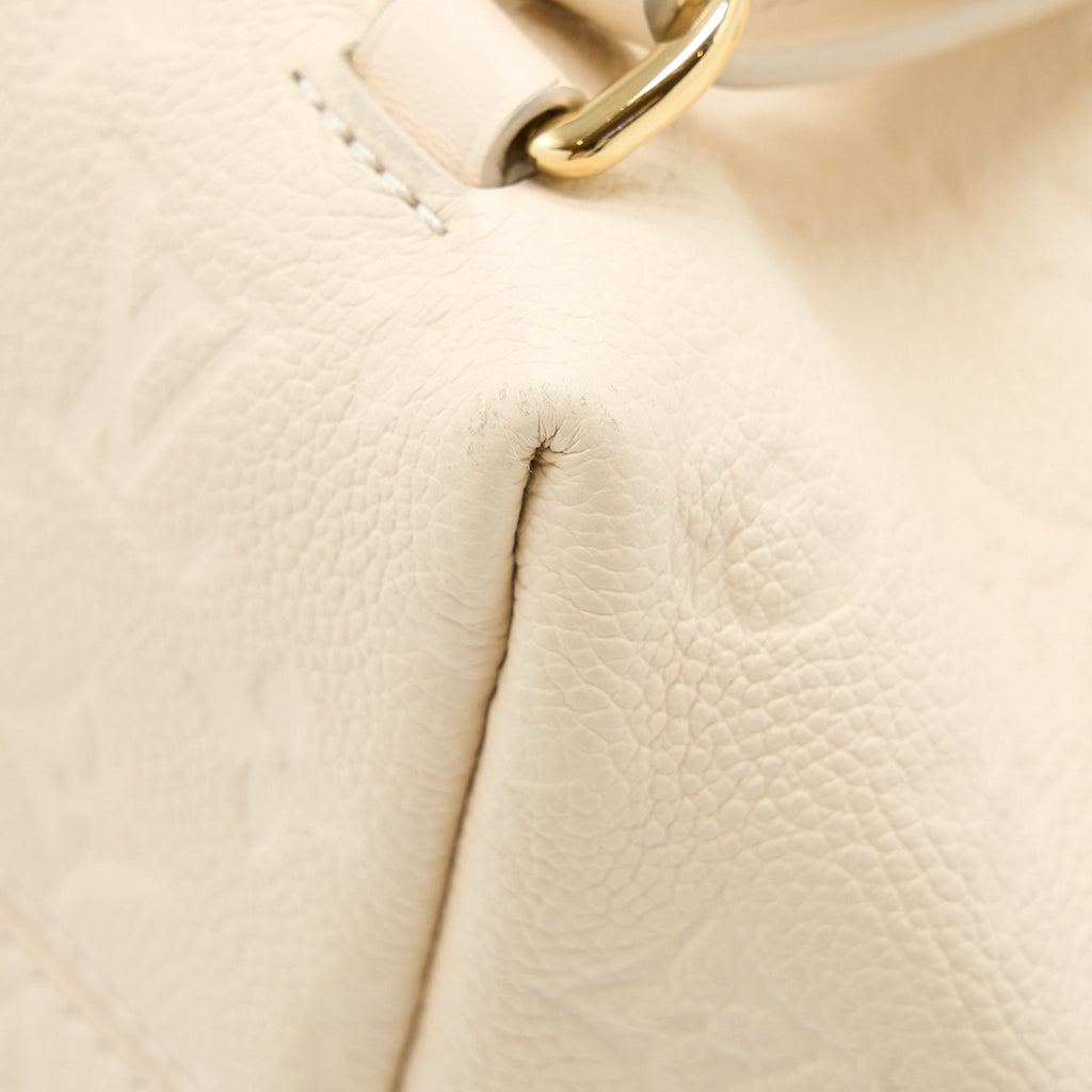 louis-vuitton-montsouris-monogram-empreinte-cream-ghw