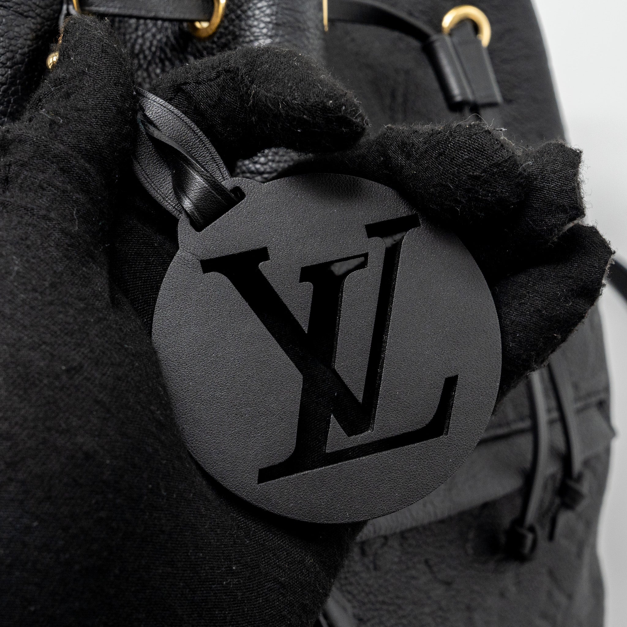 louis-vuitton-montsouris-pm-backpack-monogram-empreinte-leather-ghw