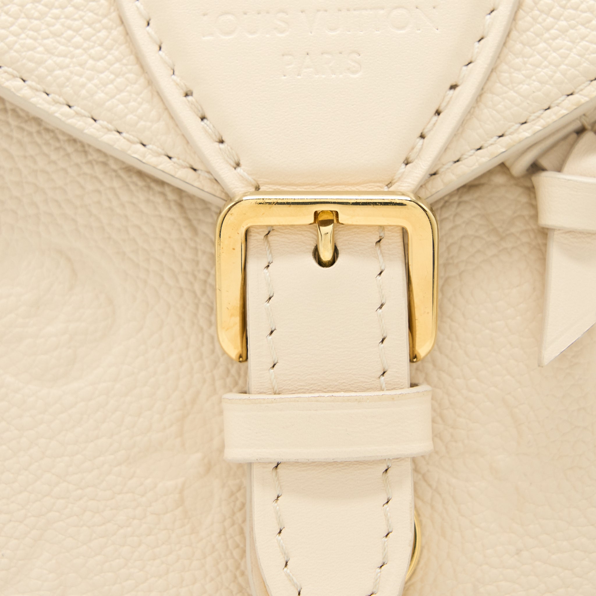 louis-vuitton-montsouris-monogram-empreinte-cream-ghw