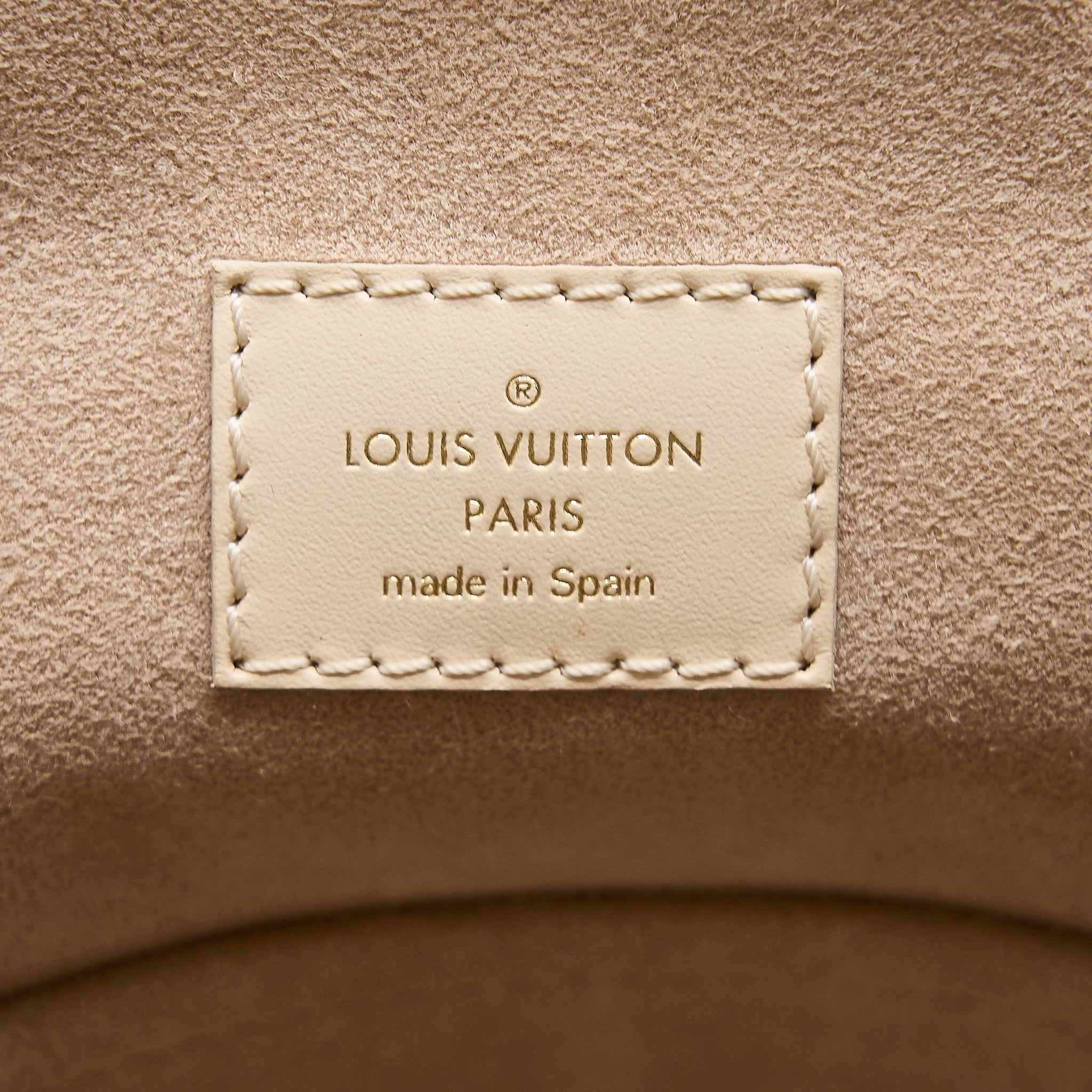 louis-vuitton-montsouris-monogram-empreinte-cream-ghw