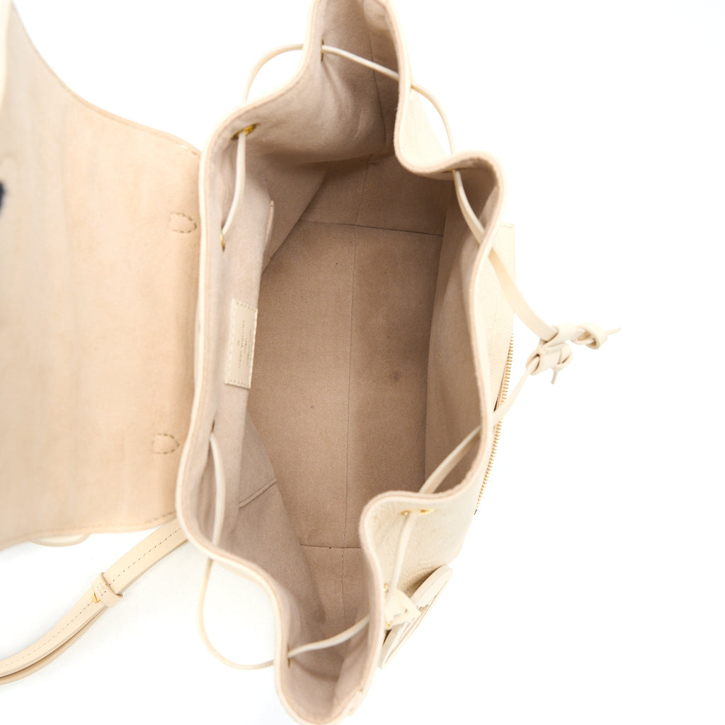 louis-vuitton-montsouris-monogram-empreinte-cream-ghw