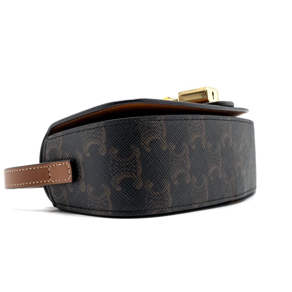 celine-clutch-on-strap-tabou-triomphe-canvas-calfskin-tan-ghw