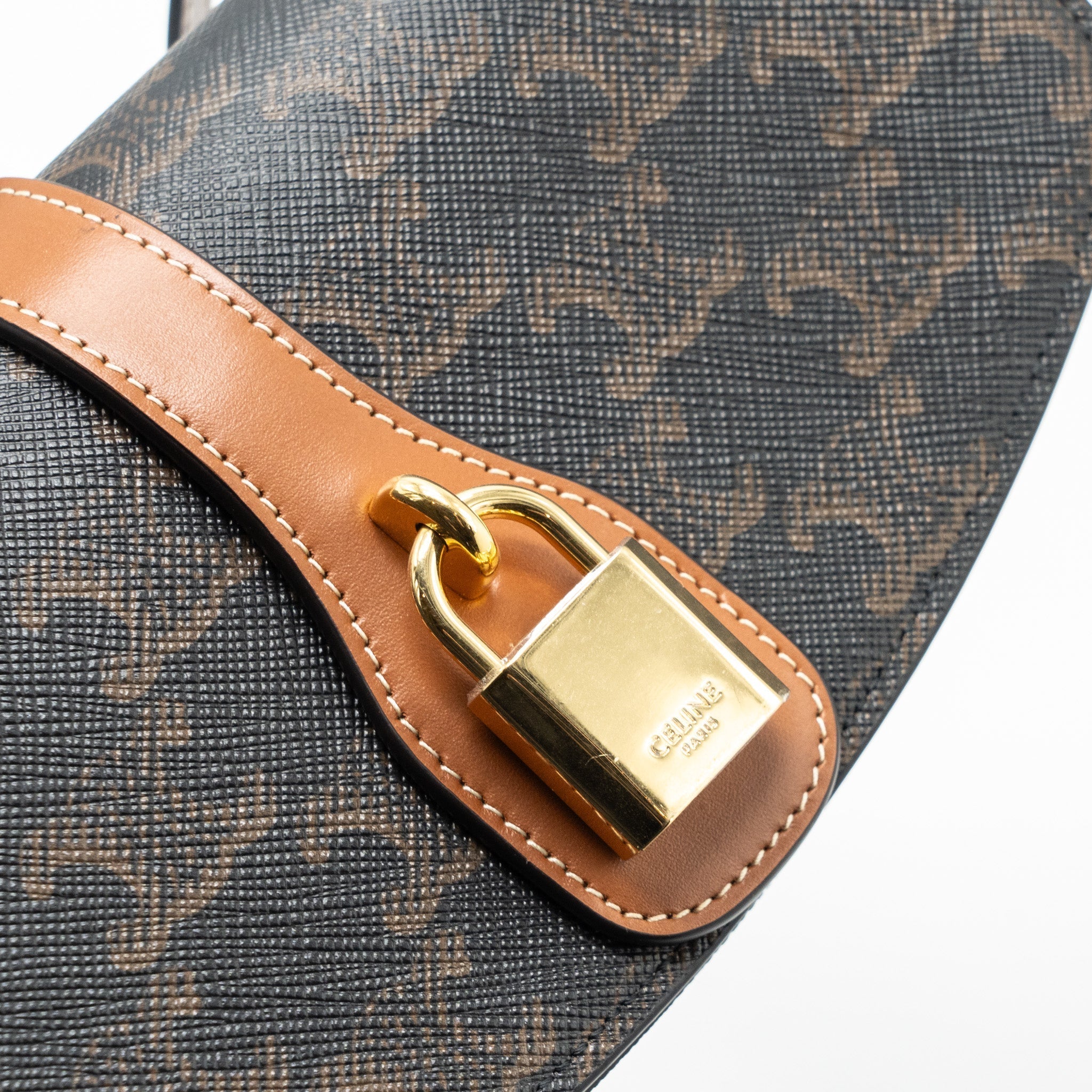 celine-clutch-on-strap-tabou-triomphe-canvas-calfskin-tan-ghw