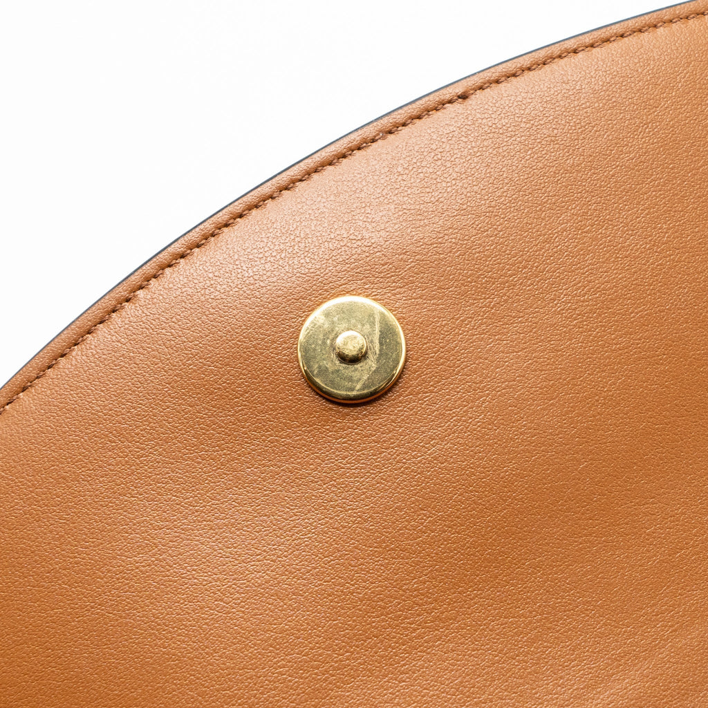 celine-clutch-on-strap-tabou-triomphe-canvas-calfskin-tan-ghw