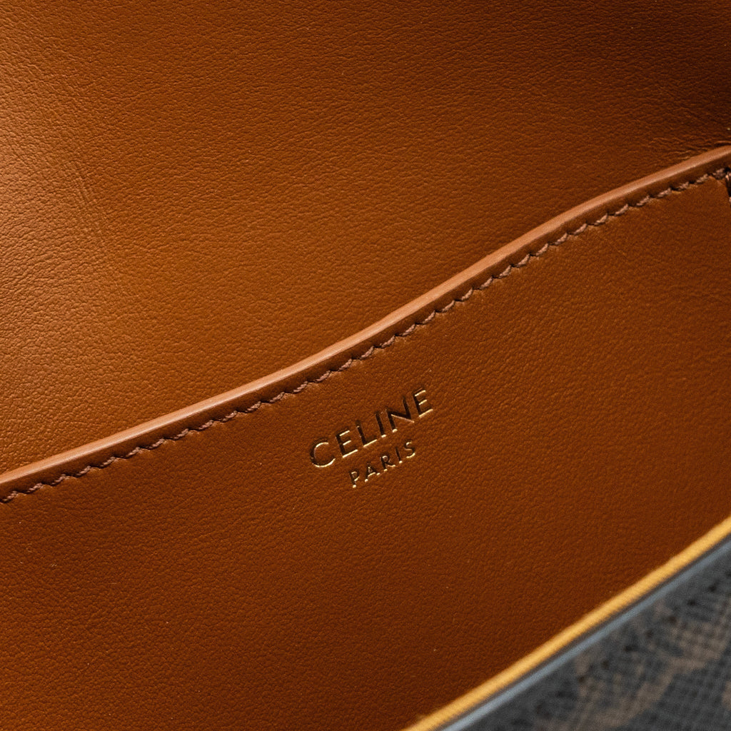 celine-clutch-on-strap-tabou-triomphe-canvas-calfskin-tan-ghw