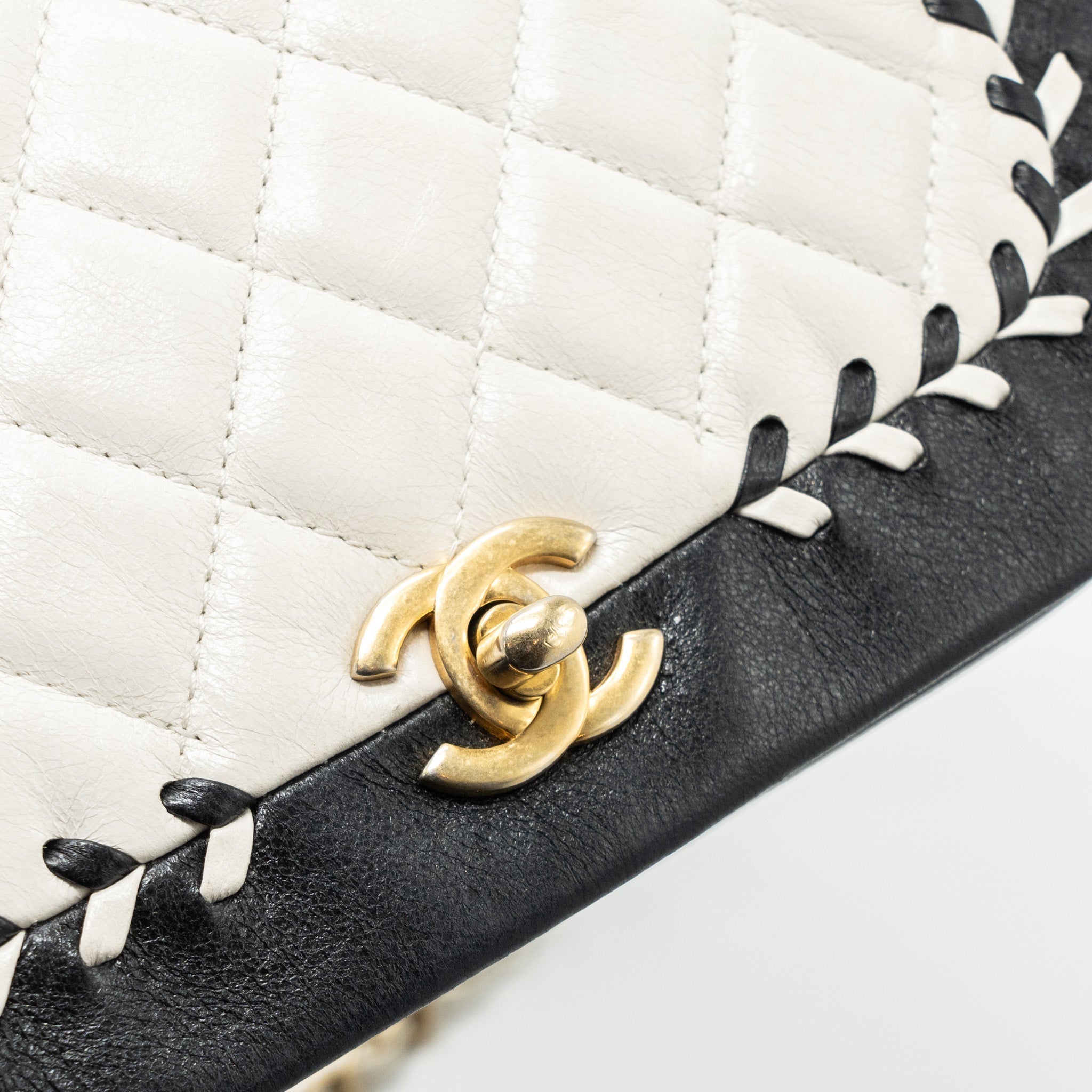 chanel-quilted-flap-bag-white-black-ghw