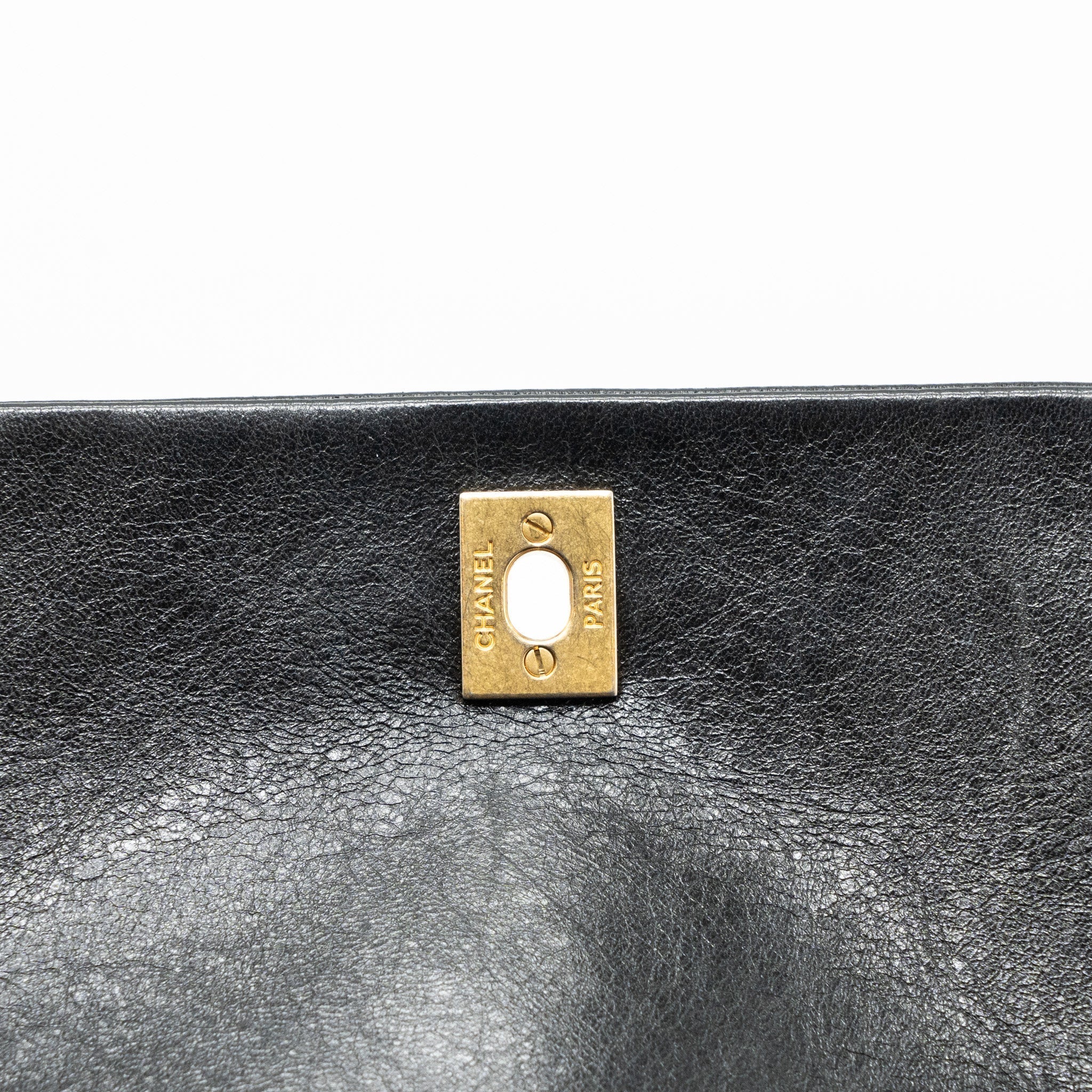 chanel-quilted-flap-bag-white-black-ghw
