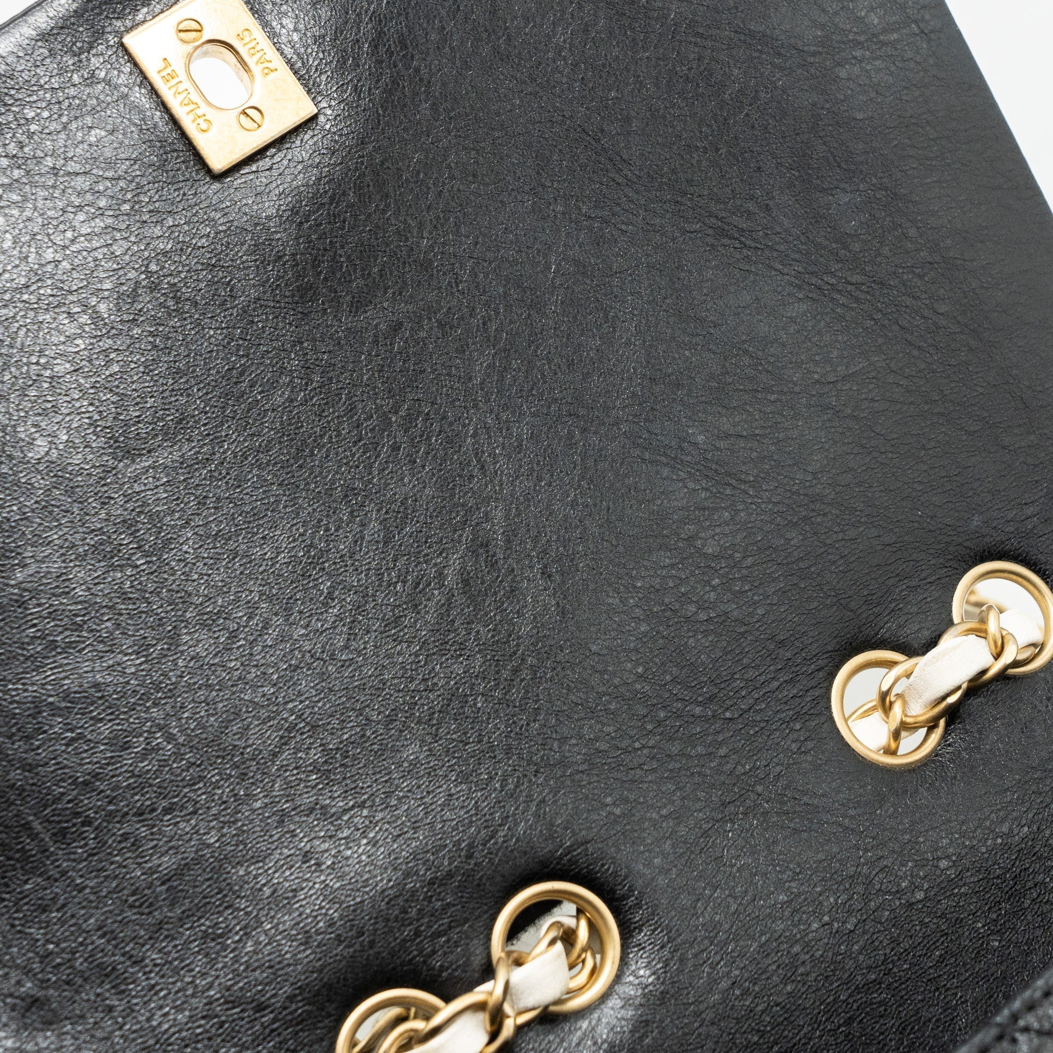 chanel-quilted-flap-bag-white-black-ghw