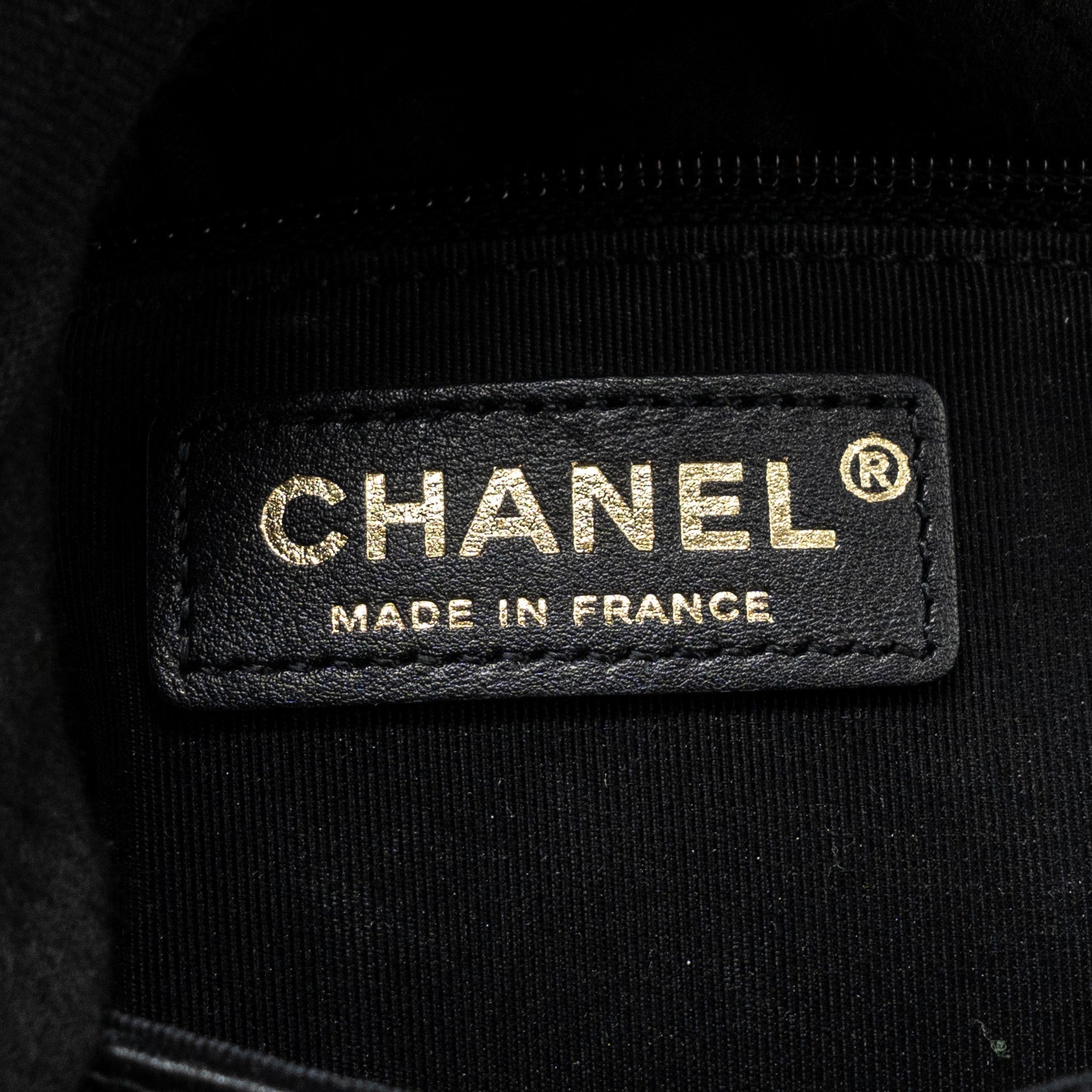 chanel-quilted-flap-bag-white-black-ghw