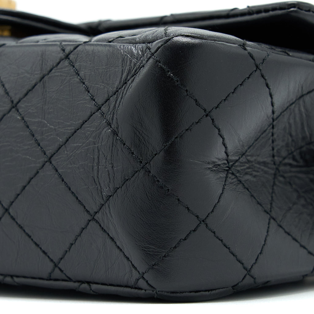 chanel-small-2-55-reissue-flap-bag-aged-calfskin-black-ghw-1