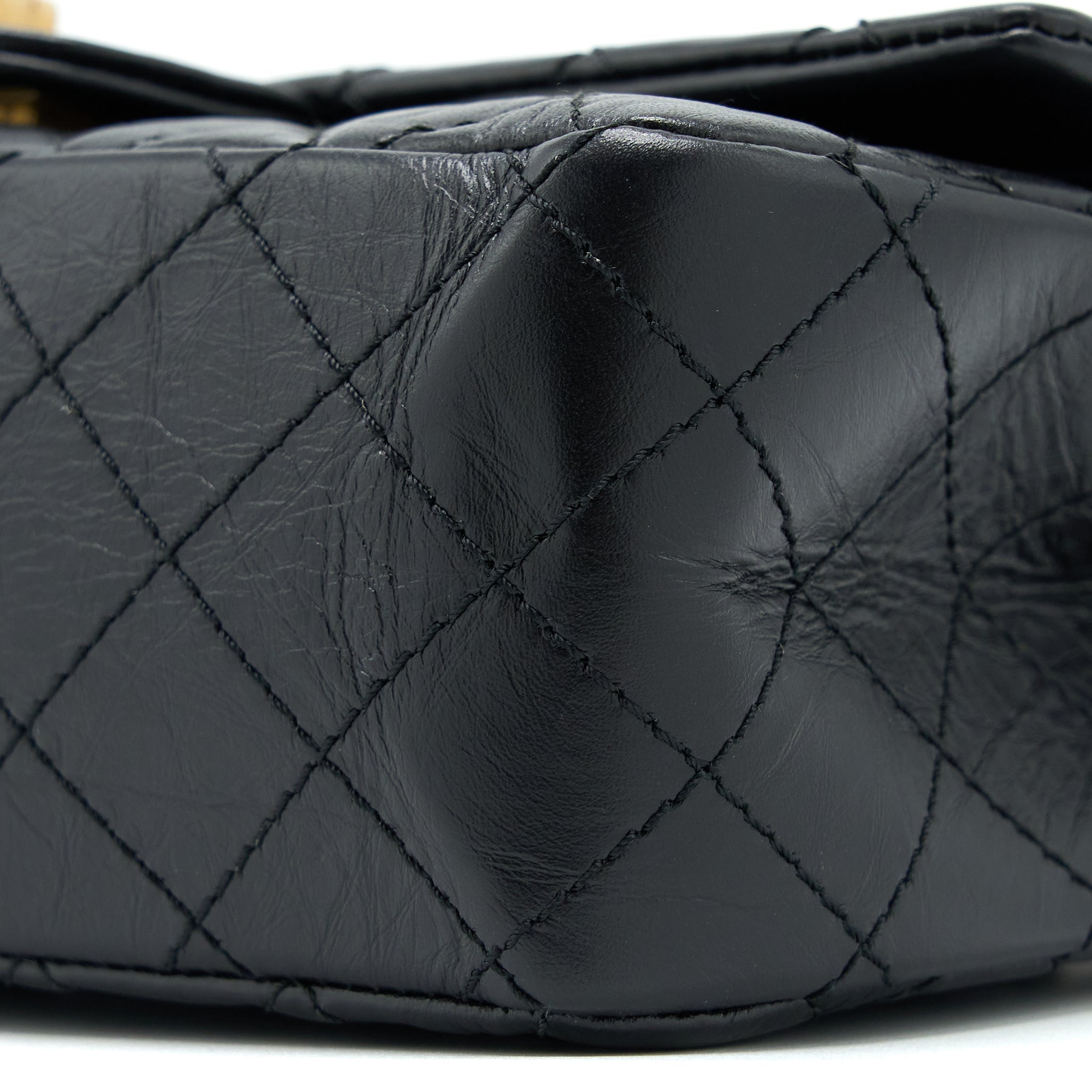 chanel-small-2-55-reissue-flap-bag-aged-calfskin-black-ghw-1