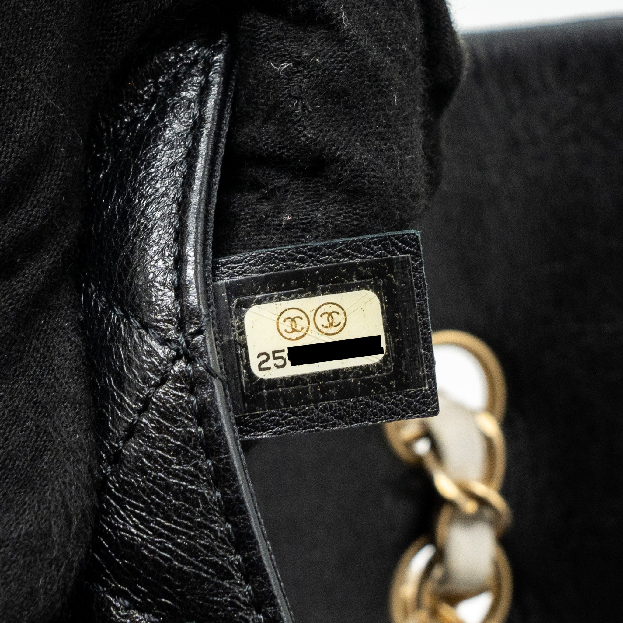 chanel-quilted-flap-bag-white-black-ghw