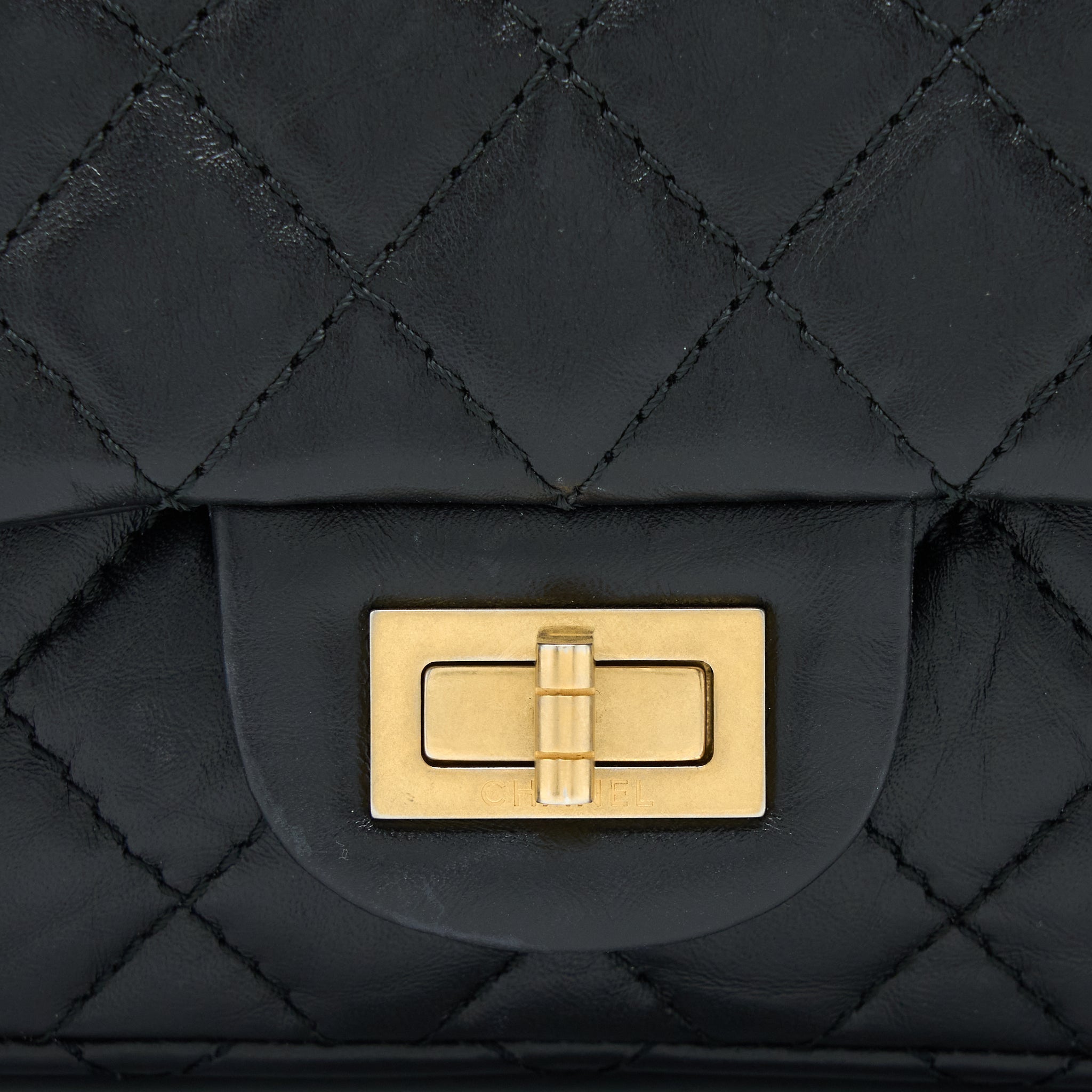 chanel-small-2-55-reissue-flap-bag-aged-calfskin-black-ghw-1