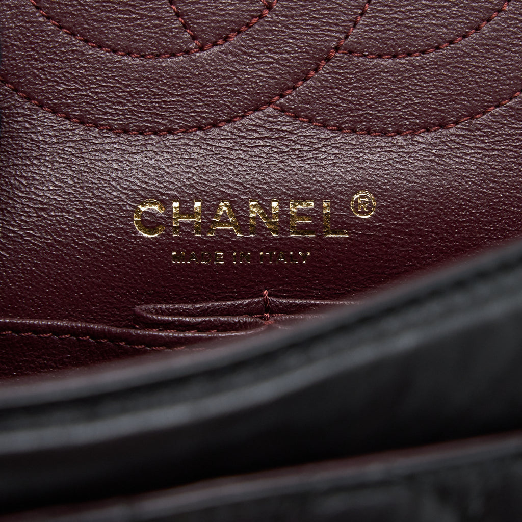 chanel-small-2-55-reissue-flap-bag-aged-calfskin-black-ghw-1